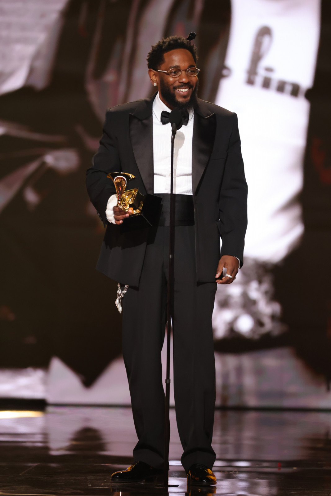 LOS ANGELES, CALIFORNIA - FEBRUARY 01: Kendrick Lamar accepts the Best Rap Album award for “GNX” onstage during the 68th GRAMMY Awards at Crypto.com Arena on February 01, 2026 in Los Angeles, California. (Photo by Kevin Winter/Getty Images for The Recording Academy)