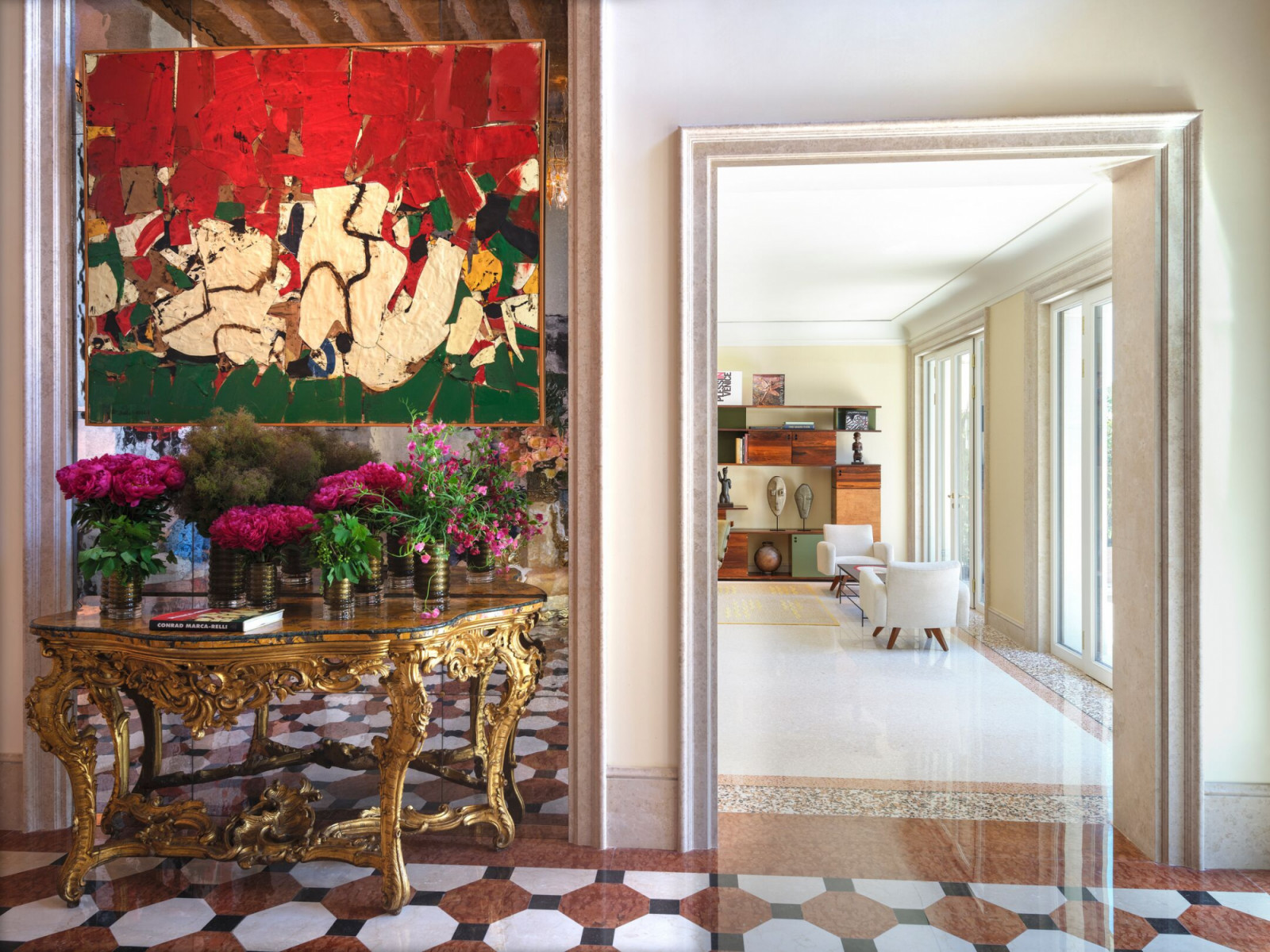 Entry halls pair historic terrazzo floors with large-scale contemporary paintings and 18th-century Venetian furniture, maintaining the artistic sophistication that has made this a preferred film hotel for cinema's elite.