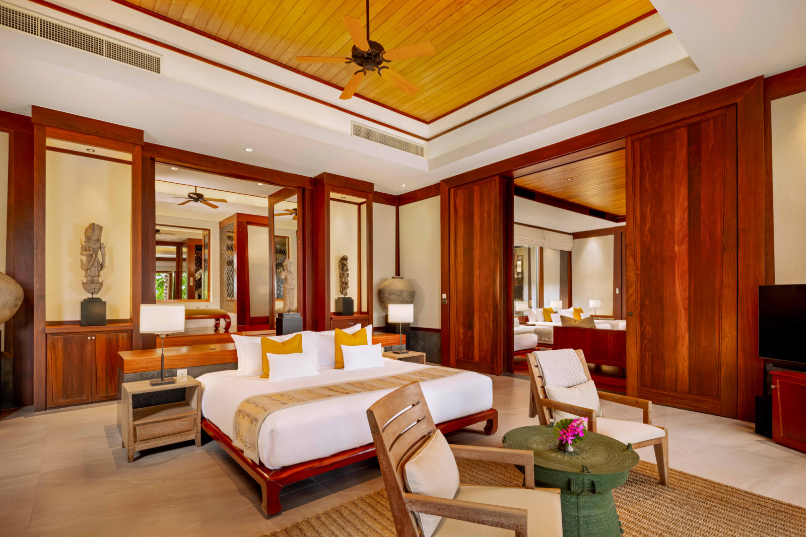 This Deluxe Ocean View Bedroom features an adjacent room with rows of beds, convenient for children and their minders