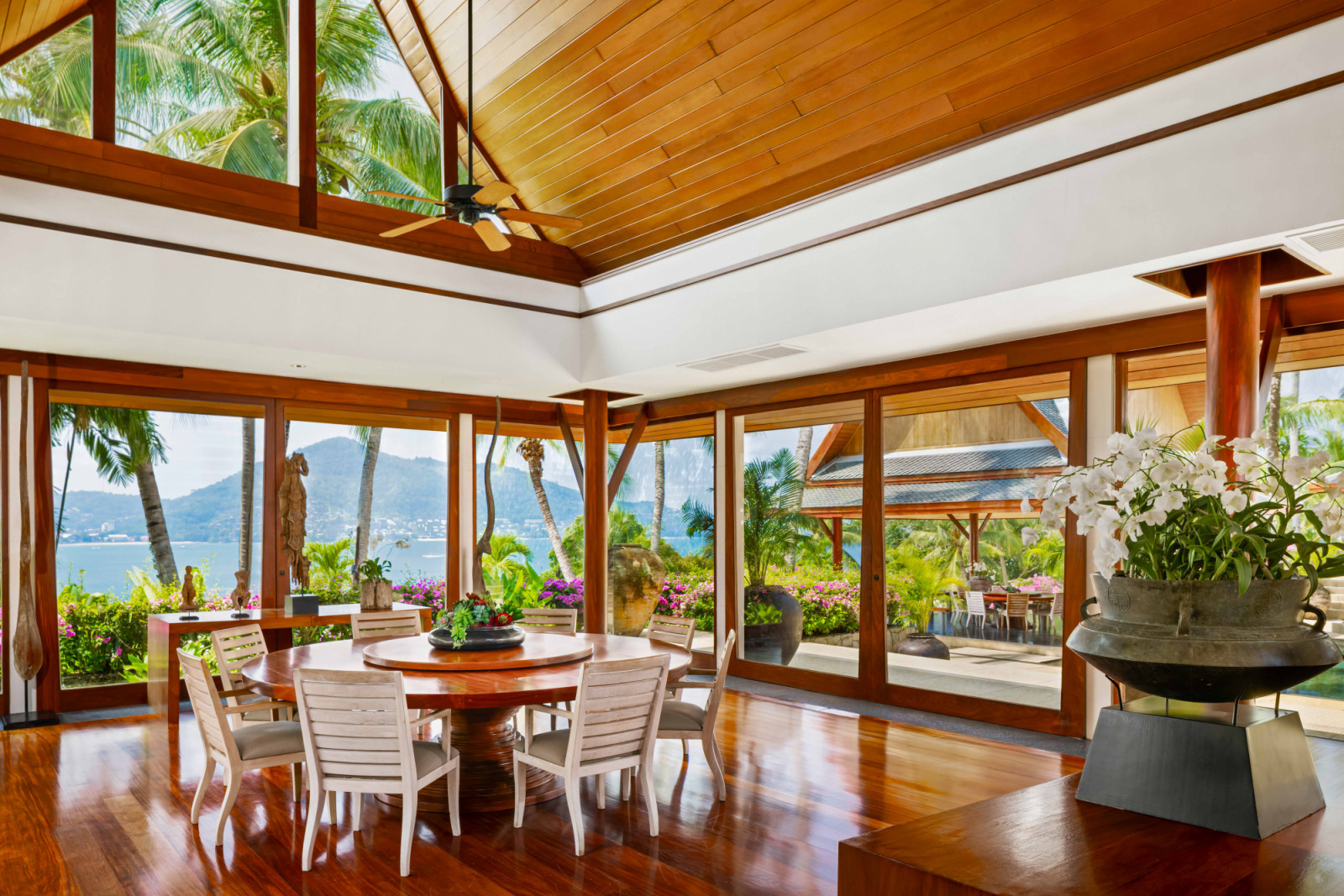 Chandara’s indoor dining area with sweeping views of the Andaman Sea