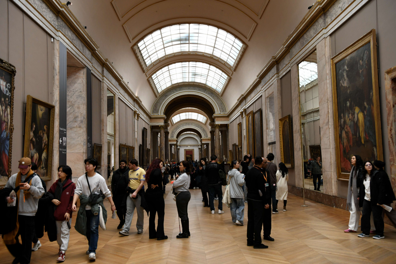 PARIS, FRANCE - JANUARY 14: Visitors tour the Louvre Museum on January 14, 2026 in Paris, France. The Louvre Museum raised admission fees for visitors from outside the European Economic Area (EEA) from 22 euros to 32 euros, an increase of 45 percent. (Photo by Li Yang/China News Service/VCG via Getty Images)