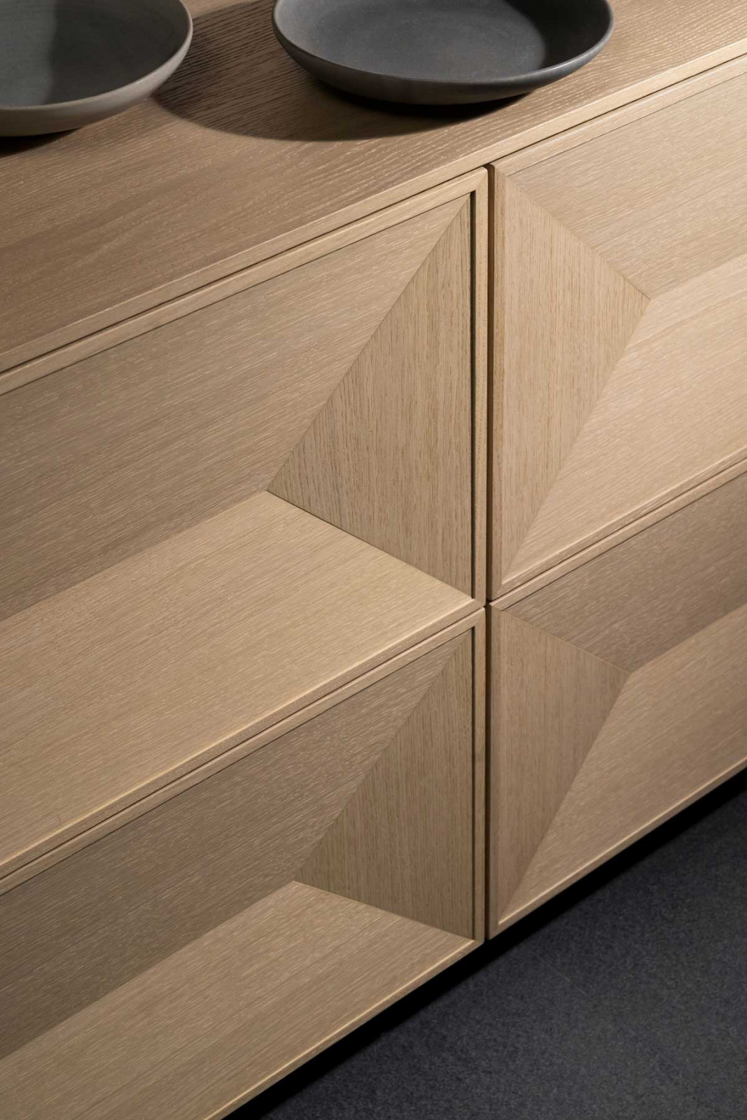 The interplay of light and shadow gives the surfaces a noticeable depth and movement