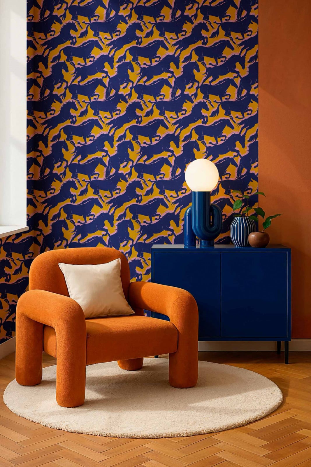 The Galope wallpaper in royal blue and burnt orange