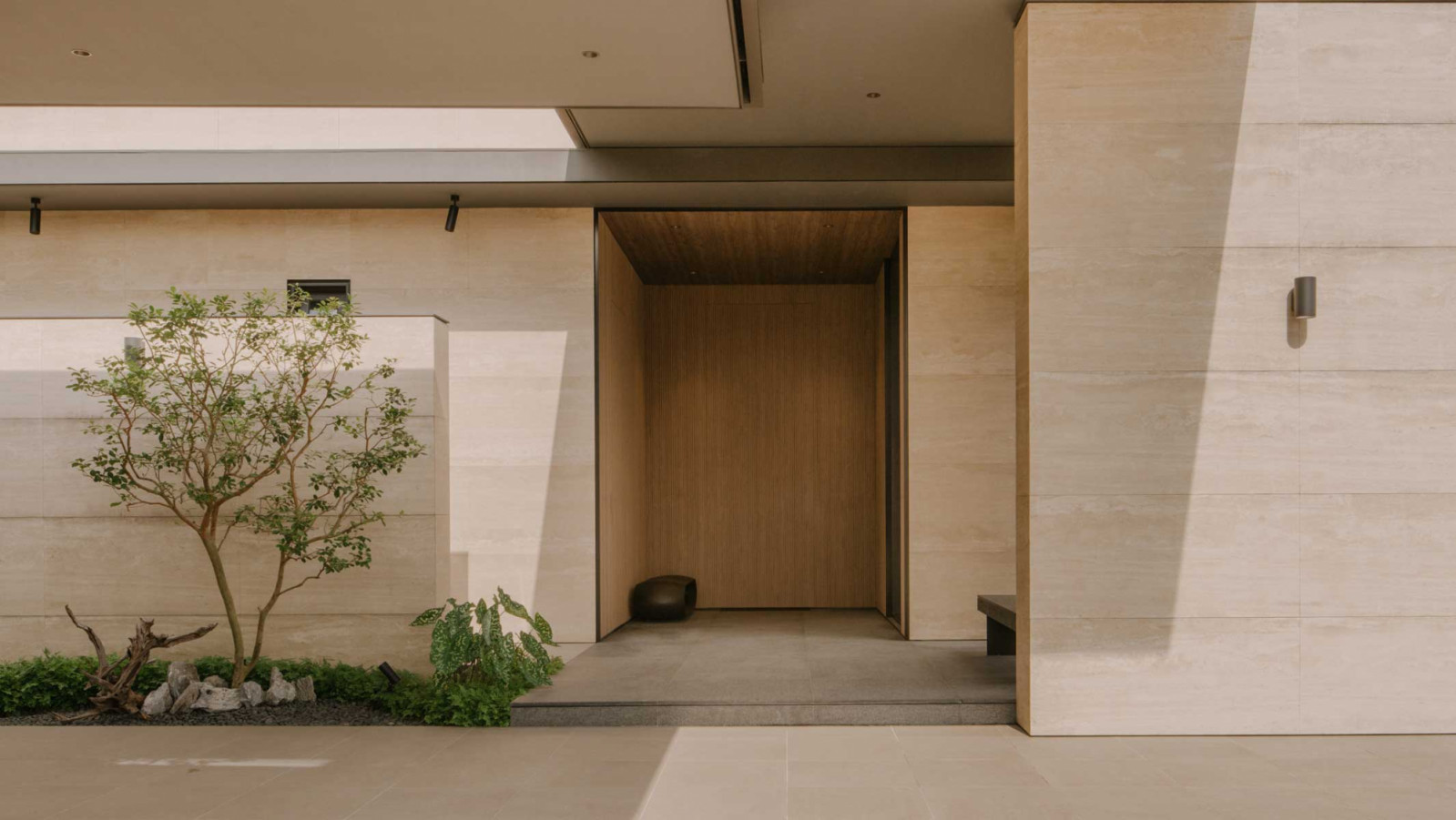 Designed by K2LD, The Fold is a bespoke Good Class Bungalow in Bukit Timah that balances privacy with openness