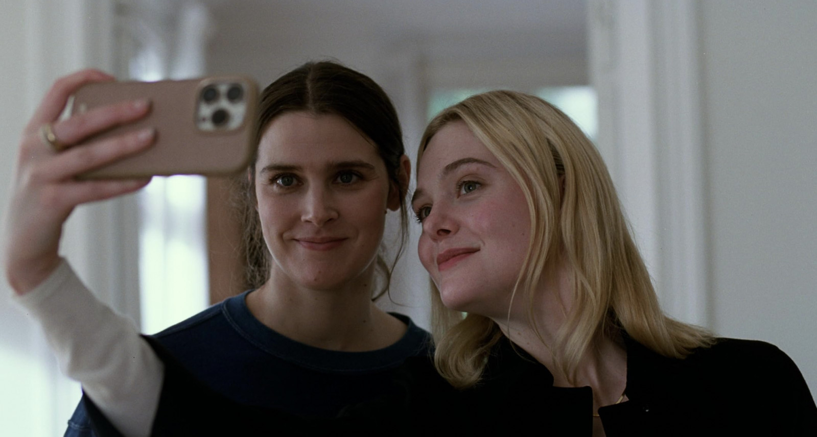 Elle Fanning and Inga Ibsdotter Lilleaas in ‘Sentimental Value’ (2025)