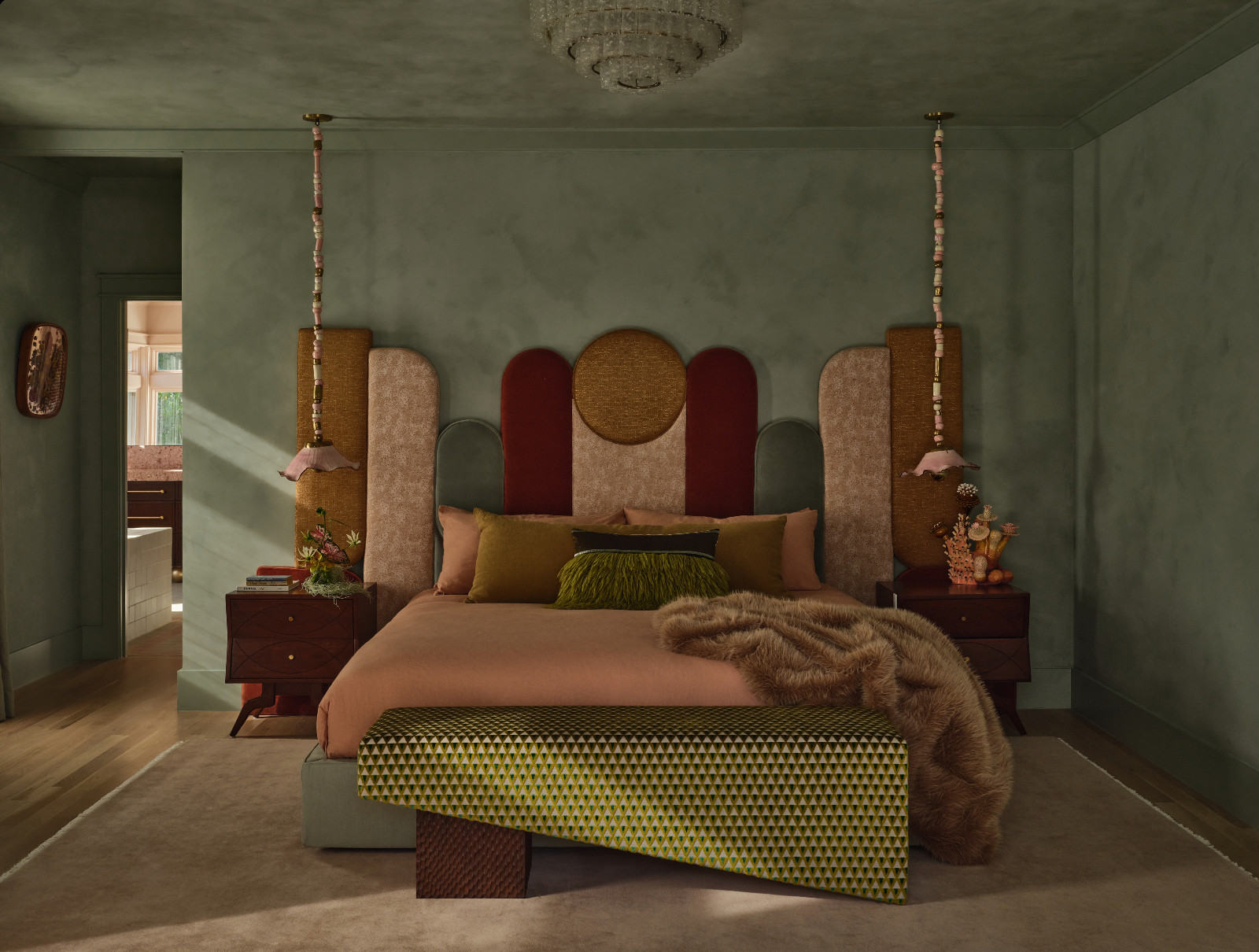 Exploring the muted jewel tones of the primary bedroom in a Pasadena, California home designed by House of Honey