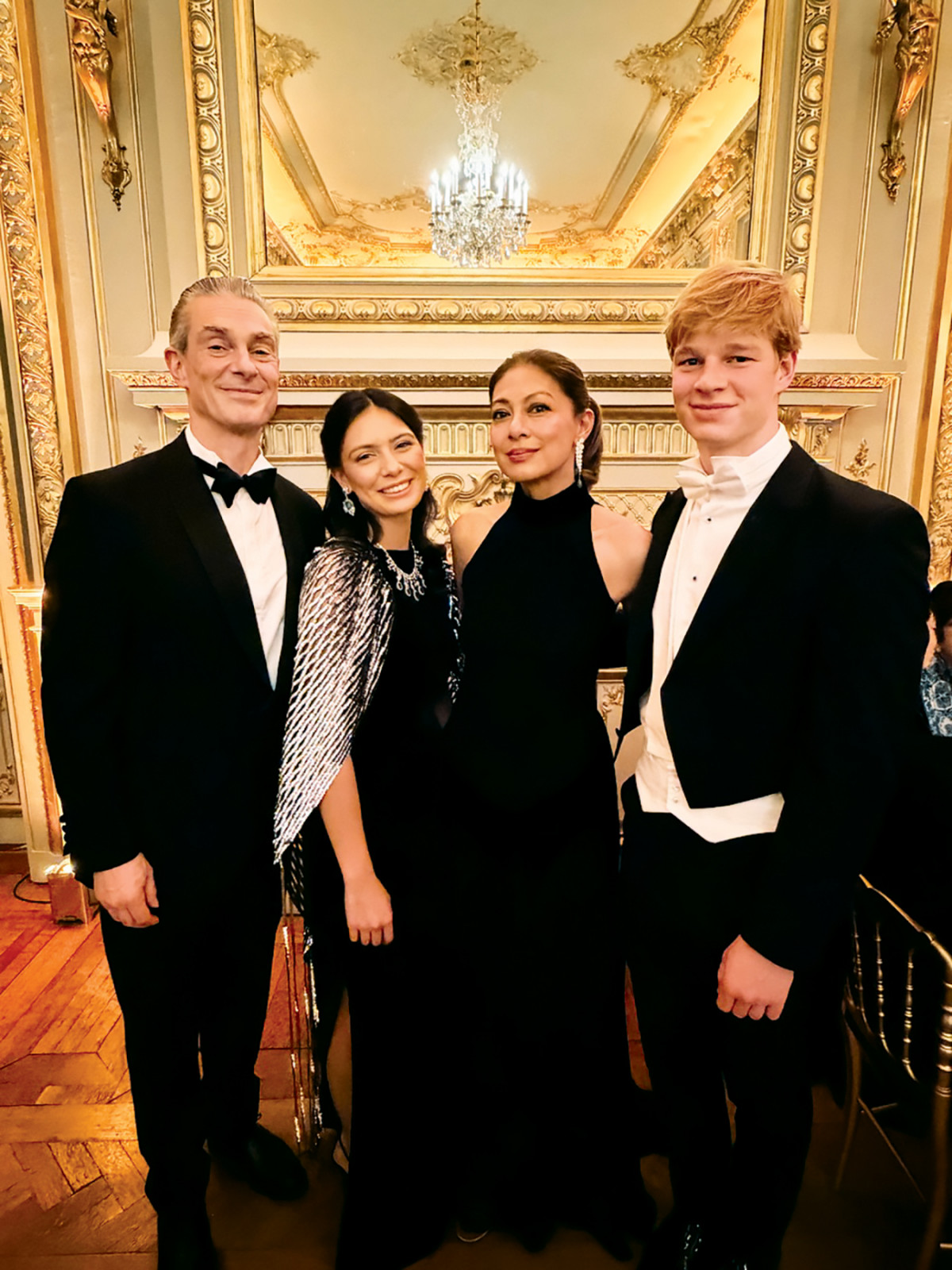Alexandra Cruz-Moxey with her family and cavalier Sebastian Corso