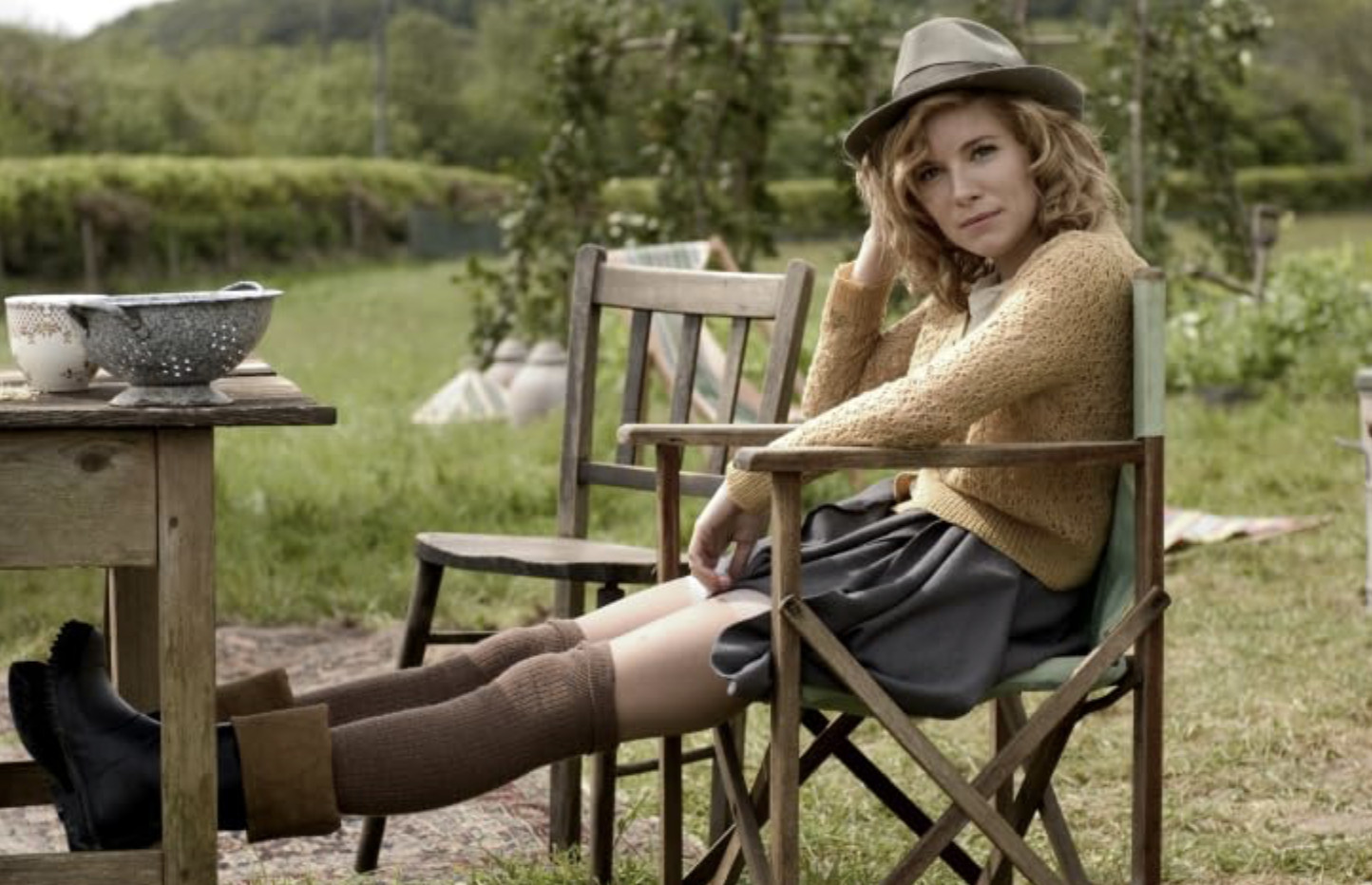 In ‘Edge of Love’, Sienna Miller wears wool coats, cashmere jumpers, and A-line skirts in muted tones, a cosy take on poetcore (Photo: The Edge of Love/IMDb)