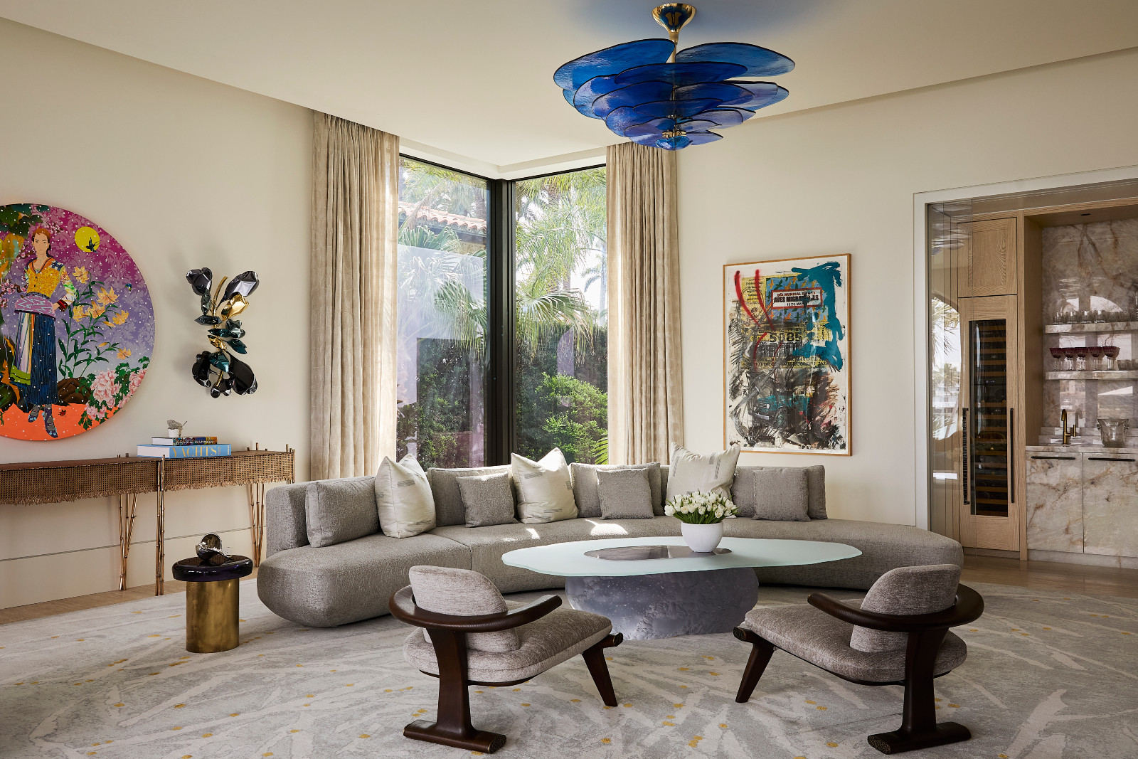 The living room in a waterfront Miami Beach home designed by Strang Architects with Pembrooke + Ives