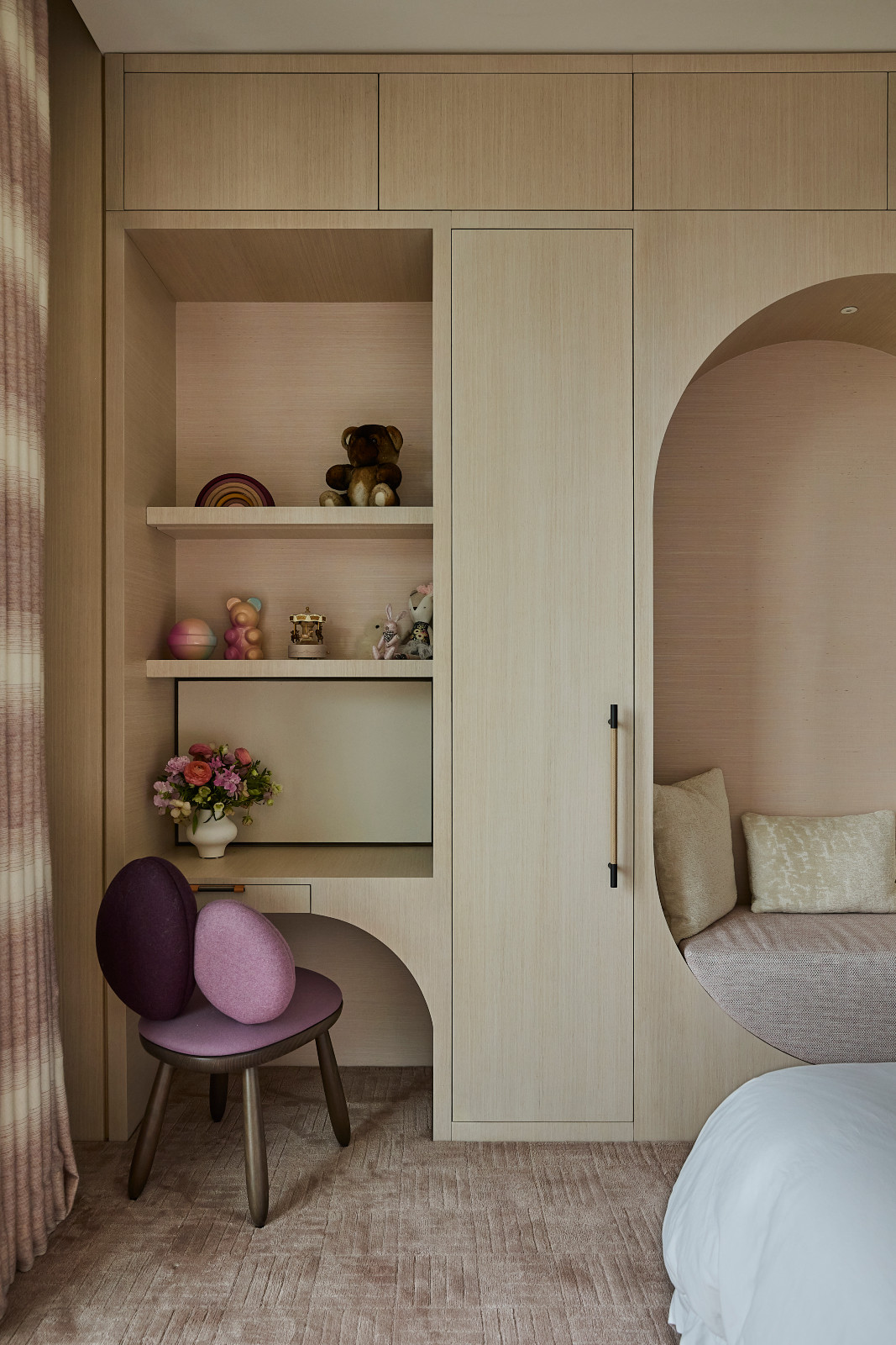 The bedroom in a waterfront Miami Beach home designed by Strang Architects with Pembrooke + Ives
