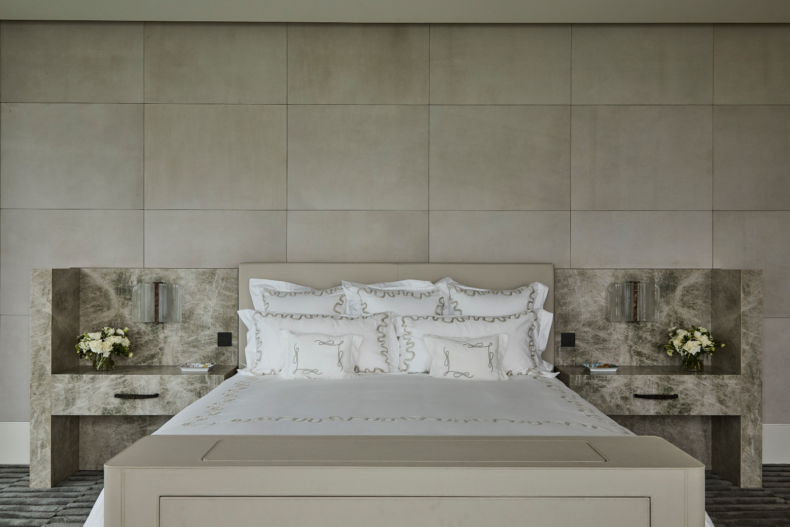 The primary bedroom in a waterfront Miami Beach home designed by Strang Architects with Pembrooke + Ives