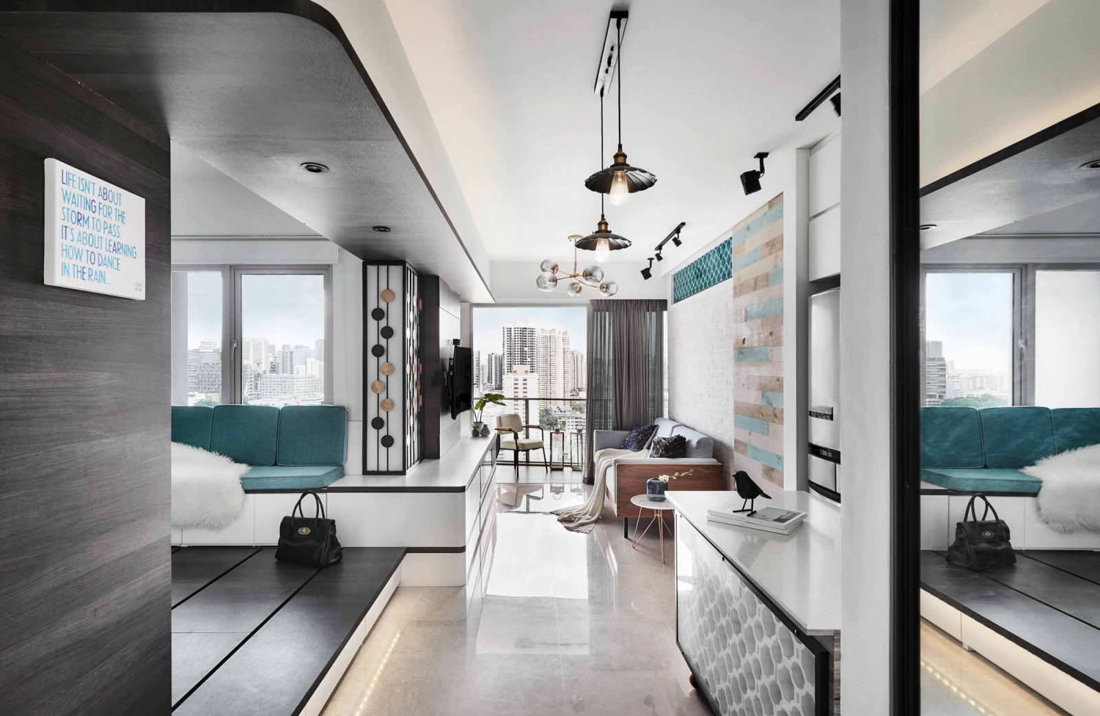 Teal accents bring richness and depth to this modern minimalist bachelorette pad