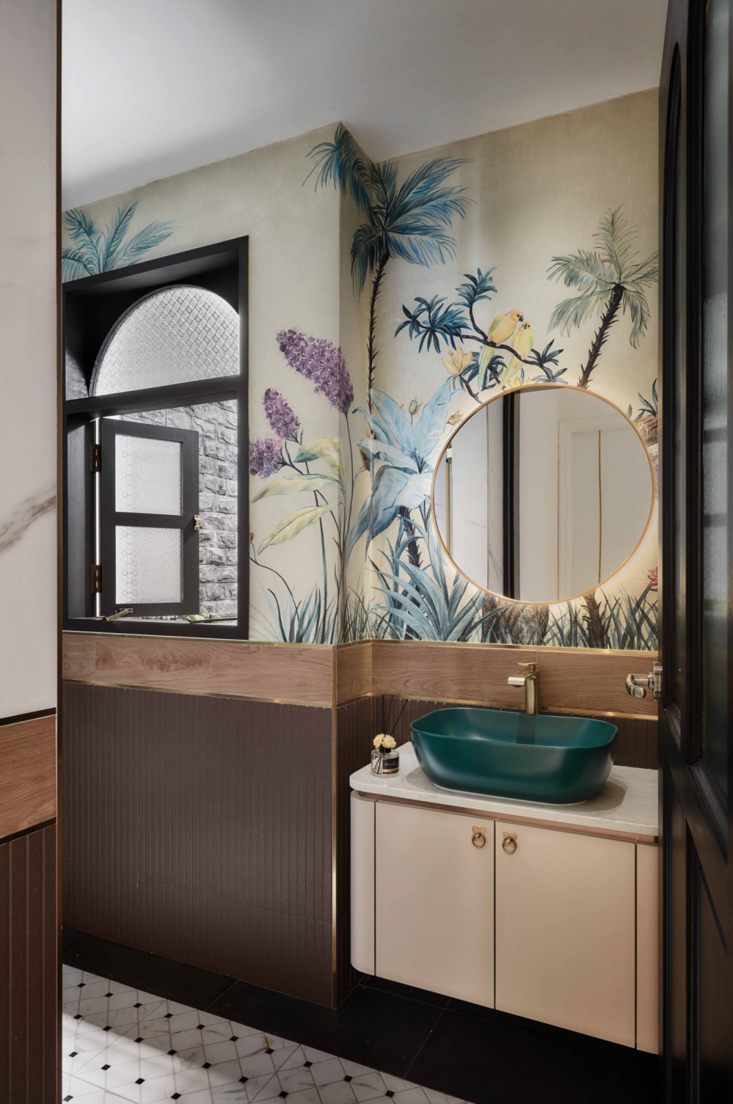 This nature-inspired powder room features a custom window overlooking a courtyard below