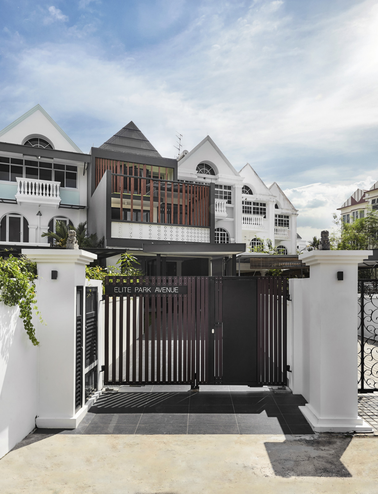 A minimalist Peranakan-inspired home at Elite Park Avenue balances heritage cues with crisp contemporary lines