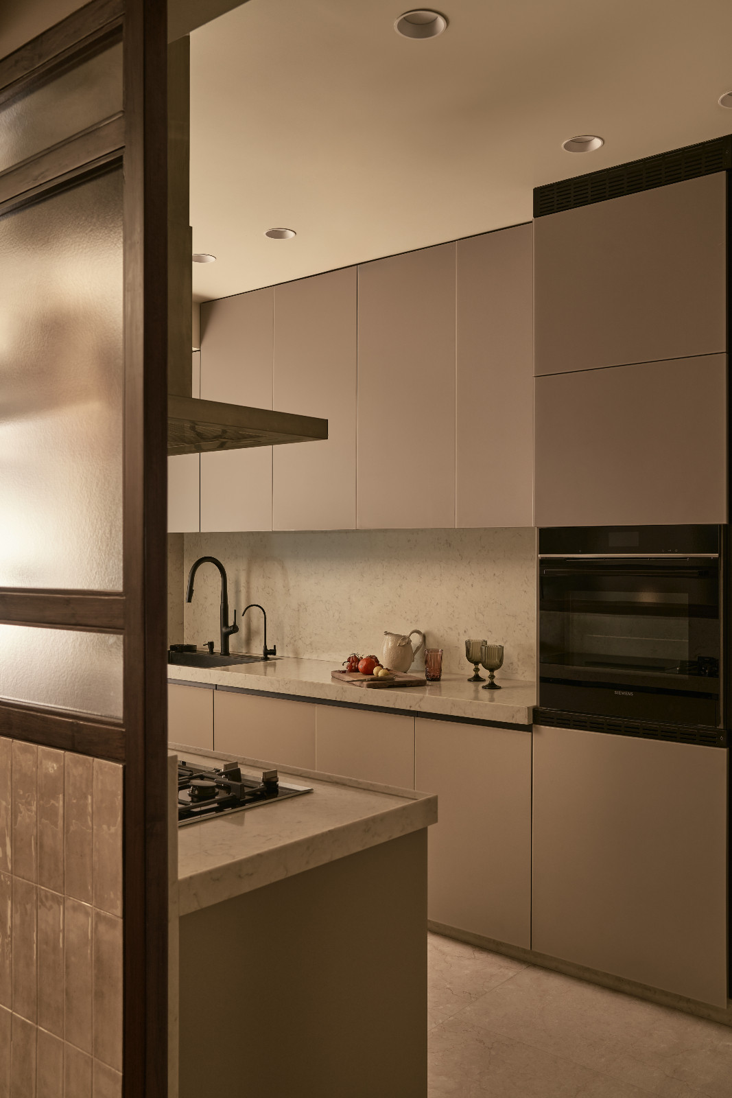 The kitchen of a Mumbai, India apartment designed by Dusq Studio