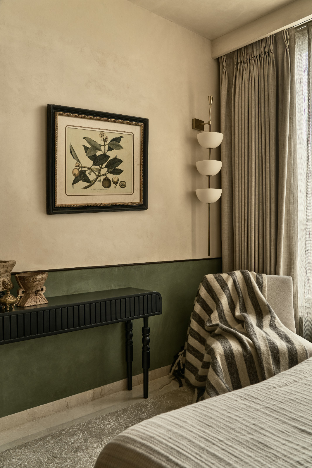 The bedroom of a Mumbai, India apartment designed by Dusq Studio