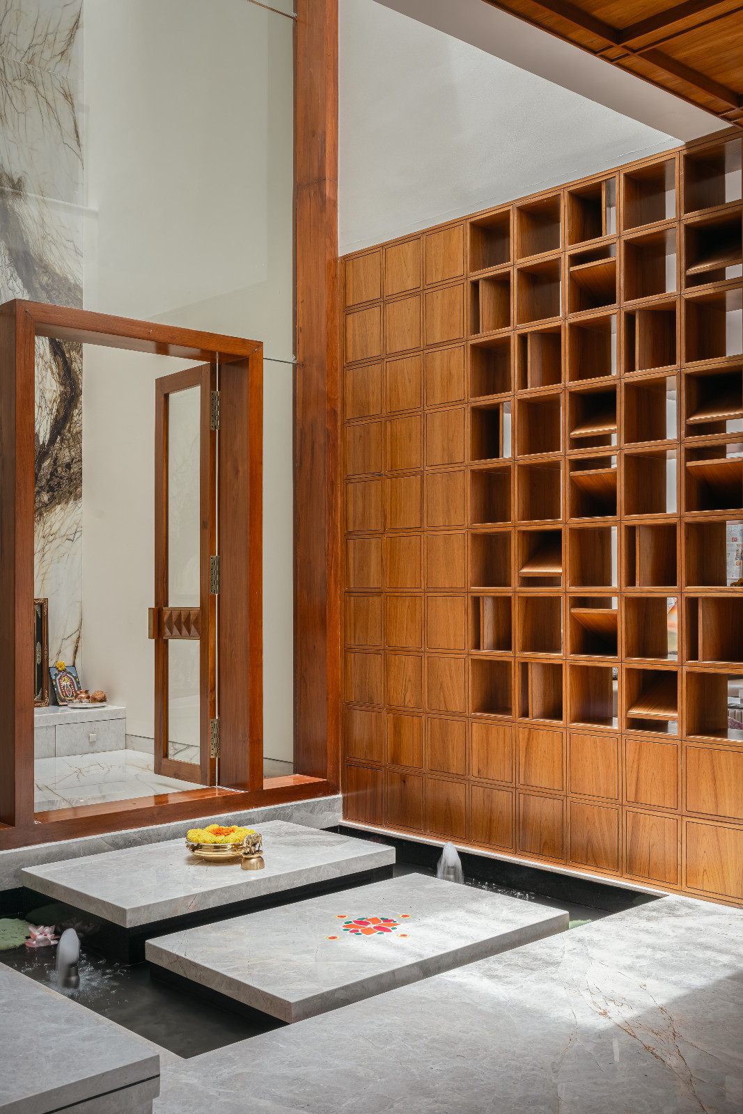 The tranquil entryway to a family home in Bengaluru, India designed by Architecture + Swath