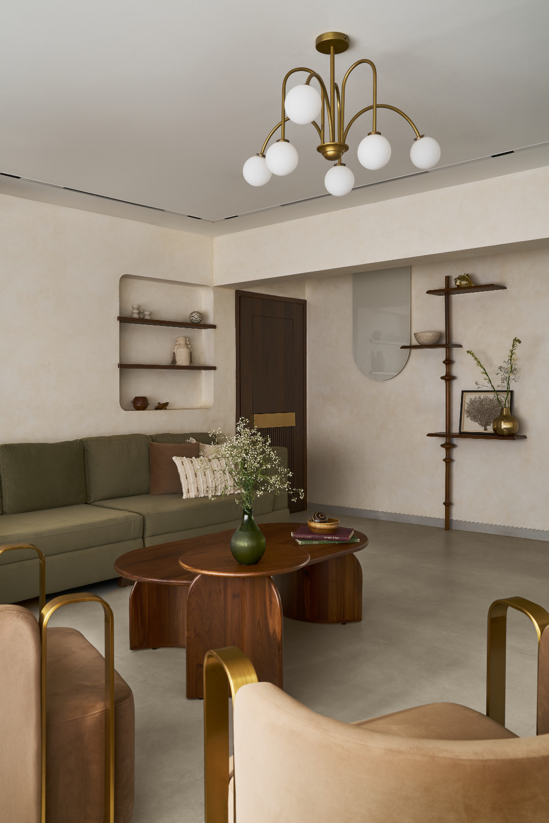 The living room of a family apartment in Mumbai, India designed by Dusq Studio
