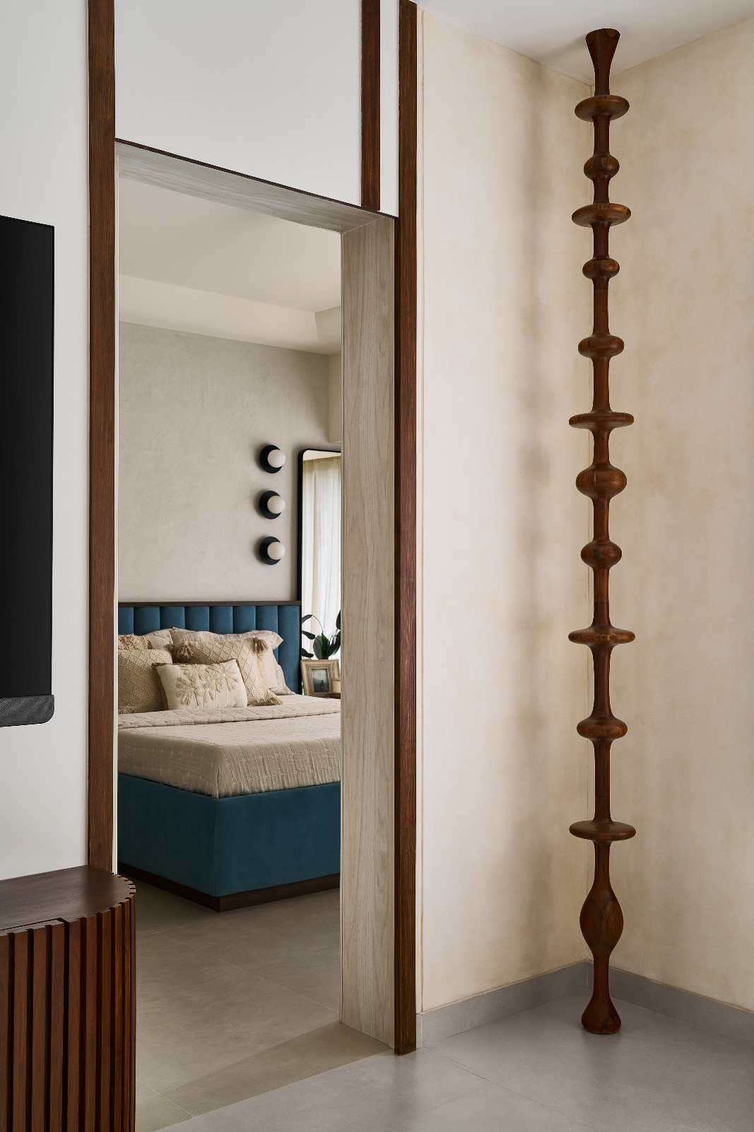 The hallway of a family apartment in Mumbai, India designed by Dusq Studio