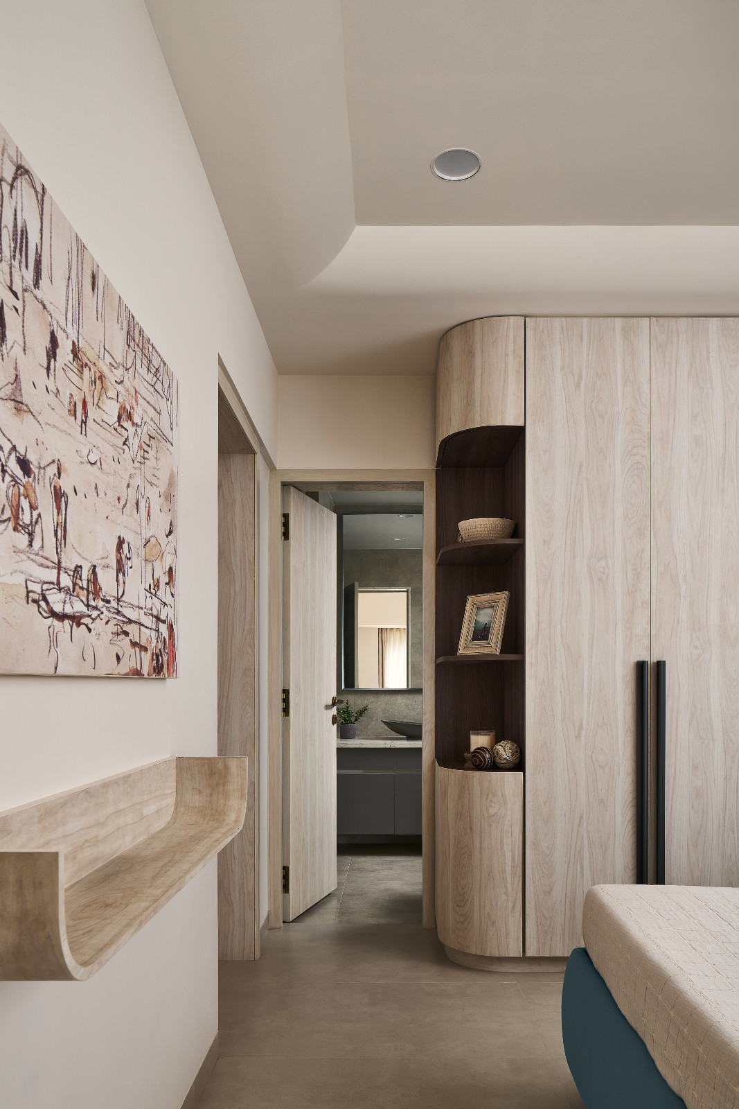 The hallway of a family apartment in Mumbai, India designed by Dusq Studio