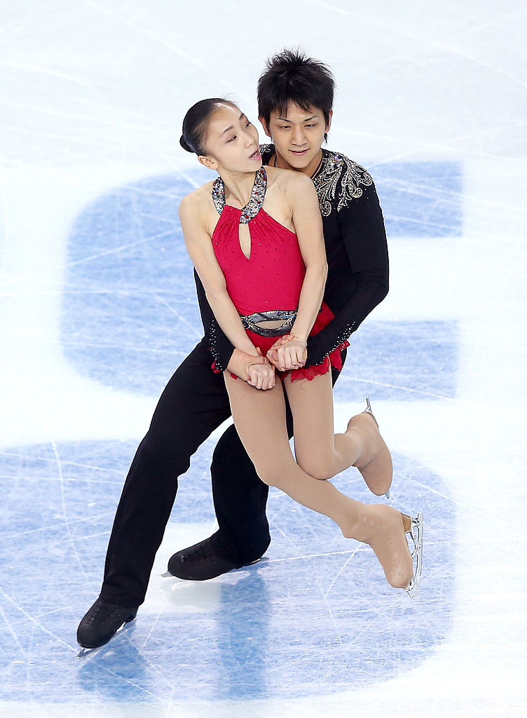 SOCHI, RUSSIA - FEBRUARY 11: Narumi Takahaski and Ryuichi Kihara of Japan compete during the Figure Skating Pairs Short Program on day four of the Sochi 2014 Winter Olympics at Iceberg Skating Palace on February 11, 2014 in Sochi, Russia. (Photo by Matthew Stockman/Getty Images)