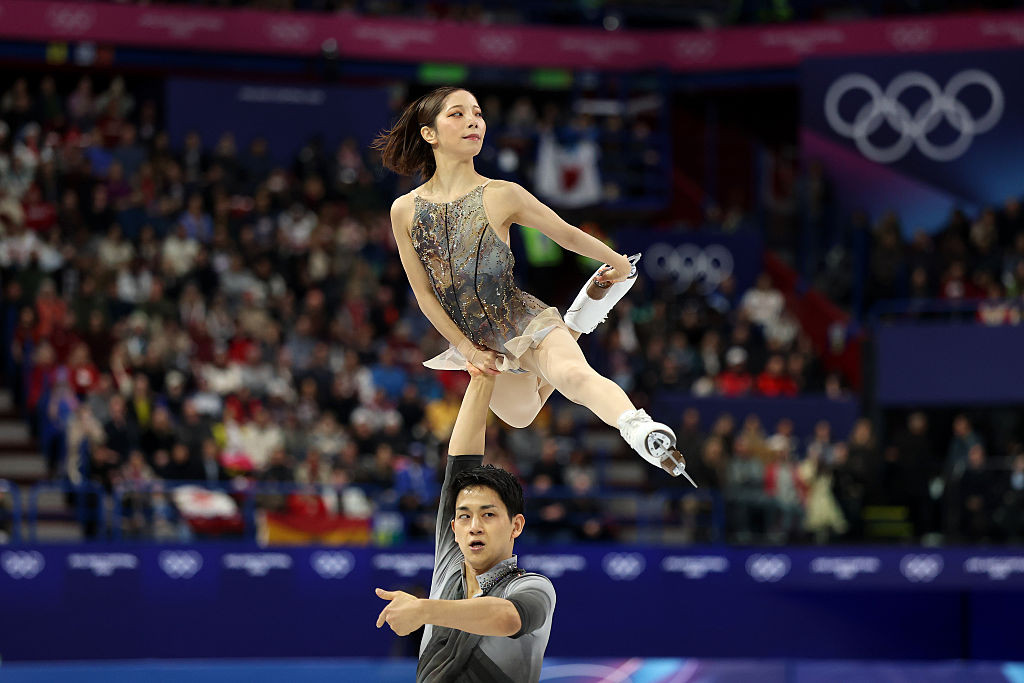 MILAN, ITALY - FEBRUARY 16: Riku Miura and partner Ryuichi Kihara of Team Japan compete during Pair Skating - Free Skating on day ten of the Milano Cortina 2026 Winter Olympic games at Milano Ice Skating Arena on February 16, 2026 in Milan, Italy. (Photo by Joosep Martinson/Getty Images)