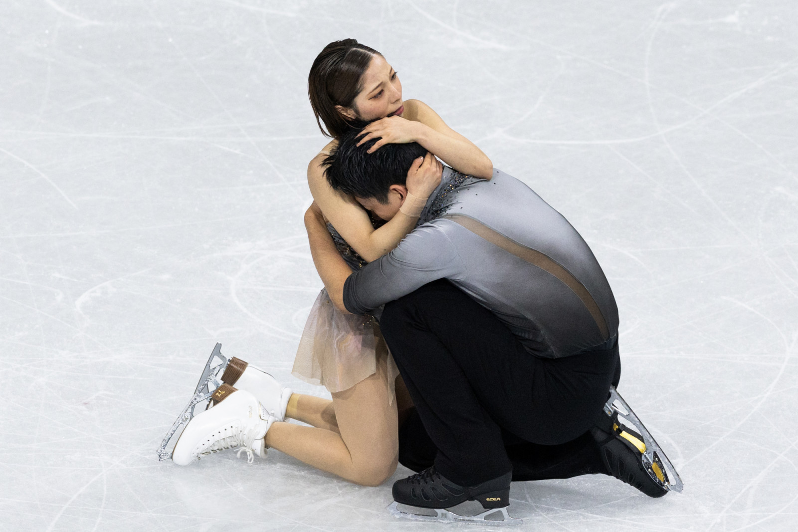 MILAN, ITALY - FEBRUARY 16: Riku Miura and Ryuichi Kihara of Japan react after competing in the Pairs Skating - Free Skating on day ten of the Milano Cortina 2026 Winter Olympic games at Milano Ice Skating Arena on February 16, 2026 in Milan, Italy.(Photo by Steve Christo - Corbis/Corbis via Getty Images)