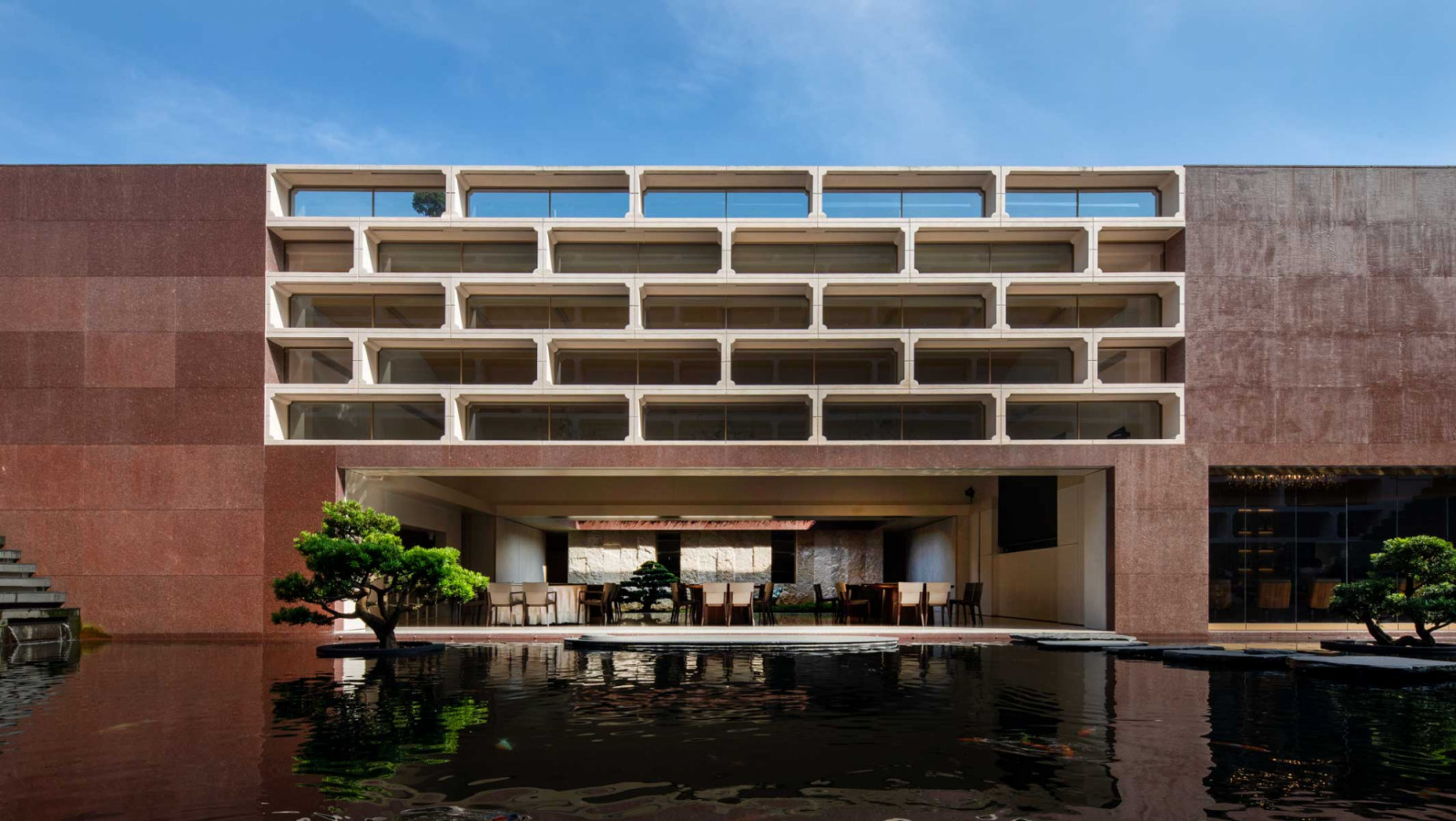 A look at the Moongate House’s banquet hall in the front block from across the water