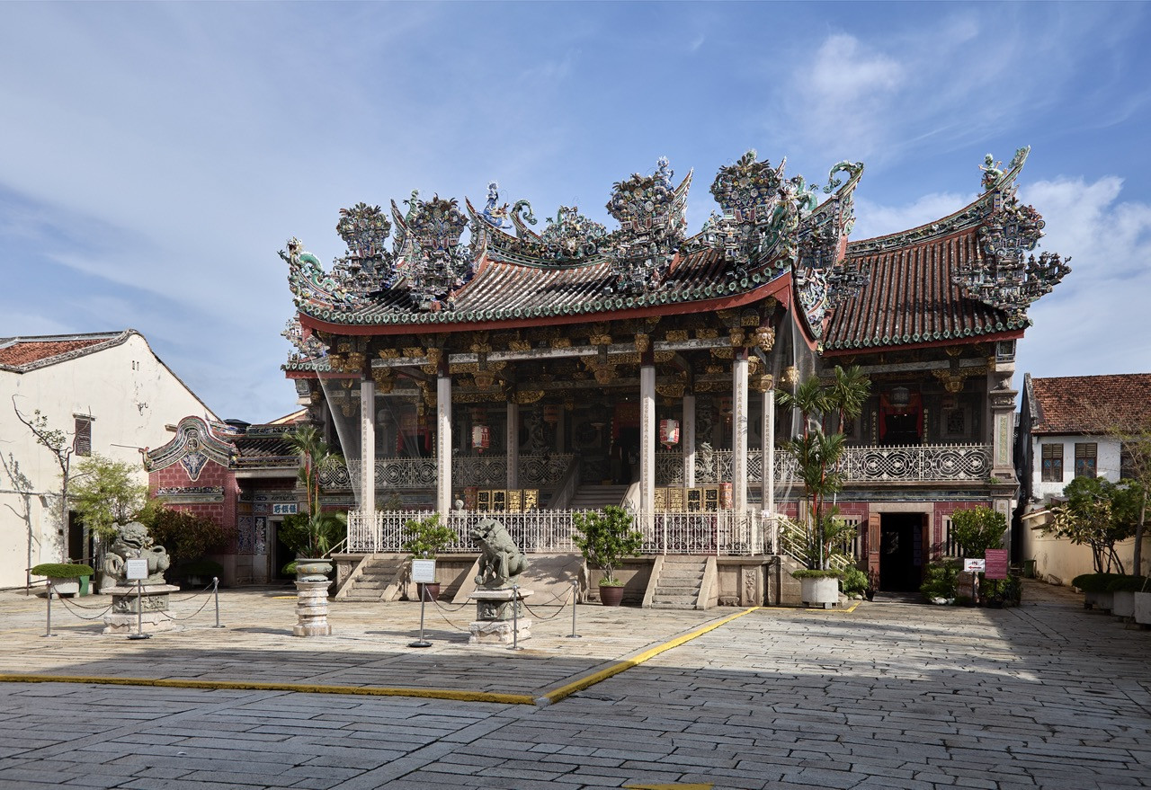 The ornate Khoo Kongsi temple, meticulously restored by Lawrence Loh Architects, anchors the historic compound where Soo K Chan spent his earliest years