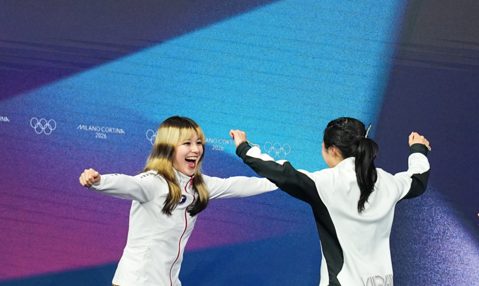 Alysa Liu (USA) and Ami Nakai (Japan) celebrate during the Women Single Skating Figure Skating, Day 13 of the Milano Cortina 2026 Winter Olympic games at Milano Ice Skating Arena on February 19, 2026 in Milan, Italy.  (Photo by Ulrik Pedersen/NurPhoto via Getty Images)
