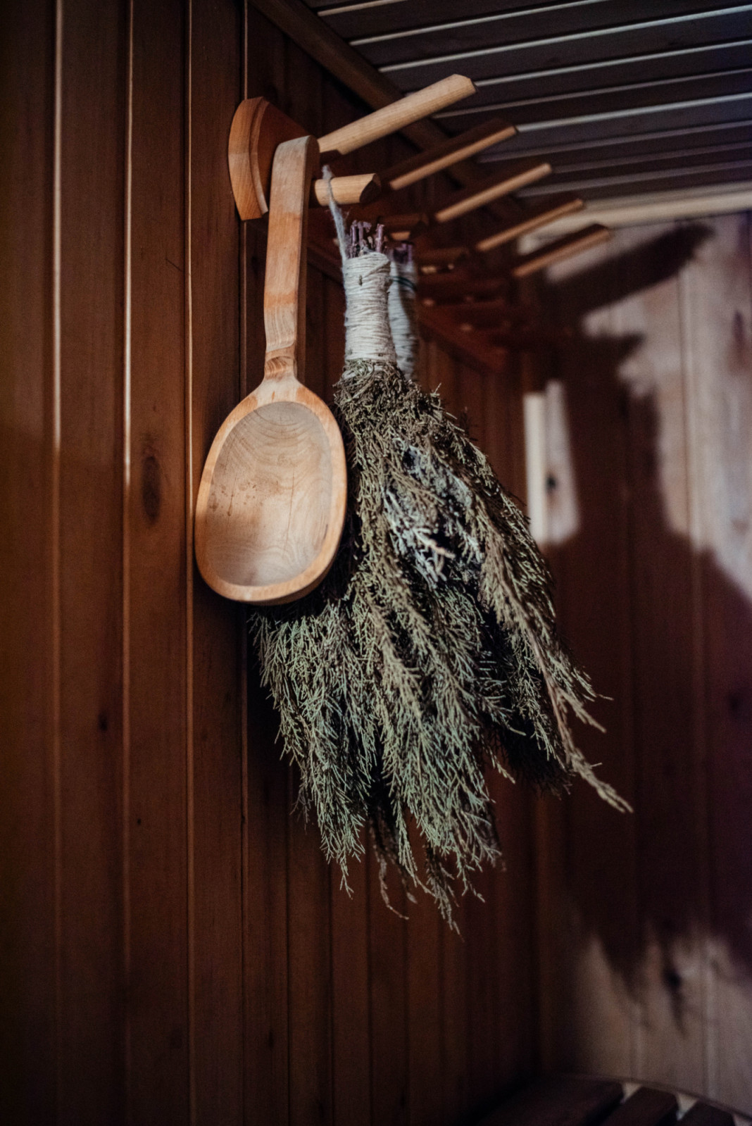 Sauna accessories, sauna broom, traditional sauna, steam bath with hot oak broom.