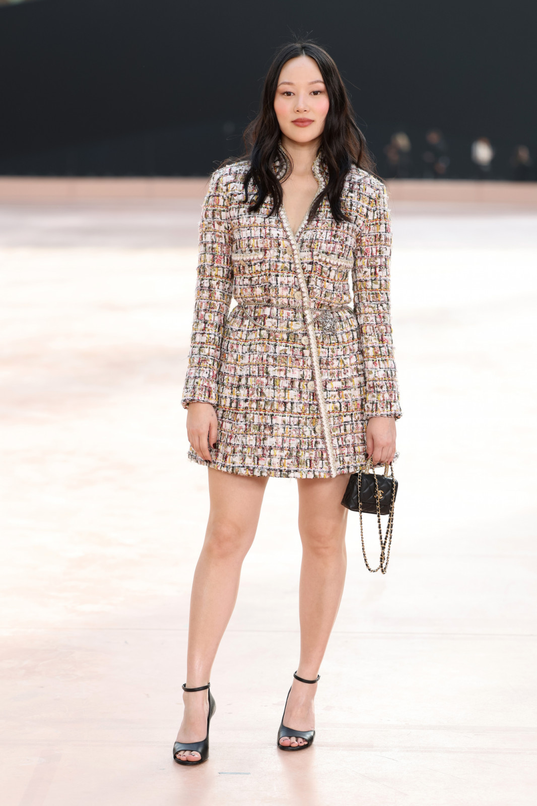 Yerin Ha mixes classic tweed and structured silhouettes for the Chanel photocall (Photo by Pascal Le Segretain/Getty Images)