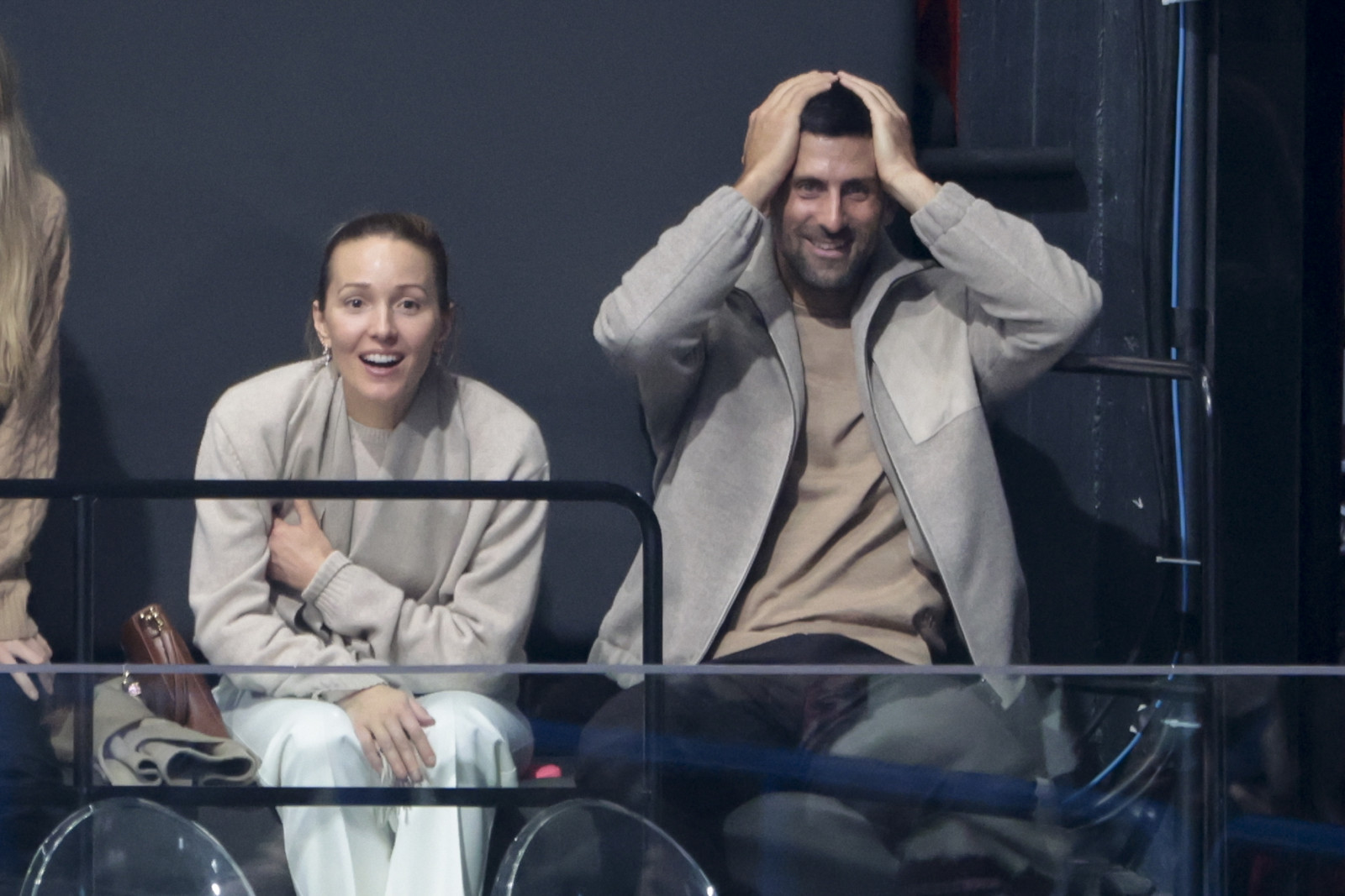 MILAN, ITALY - FEBRUARY 8: Novak Djokovic and his wife Jelena Djokovic react to the backflip of Ilia Malinin of USA during the Figure Skating Team Event on day two of the Milano Cortina 2026 Winter Olympic Games at the Milano Ice Skating Arena on February 8, 2026 in Milan, Italy. (Photo by Jean Catuffe/Getty Images)