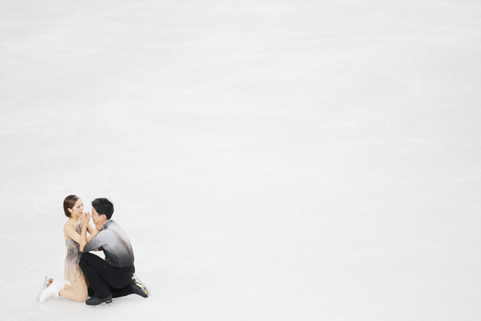 MILAN, ITALY - FEBRUARY 16: Riku Miura and partner Ryuichi Kihara of Team Japan compete during Pair Skating - Free Skating on day ten of the Milano Cortina 2026 Winter Olympic games at Milano Ice Skating Arena on February 16, 2026 in Milan, Italy. (Photo by Vittorio Zunino Celotto/Getty Images)