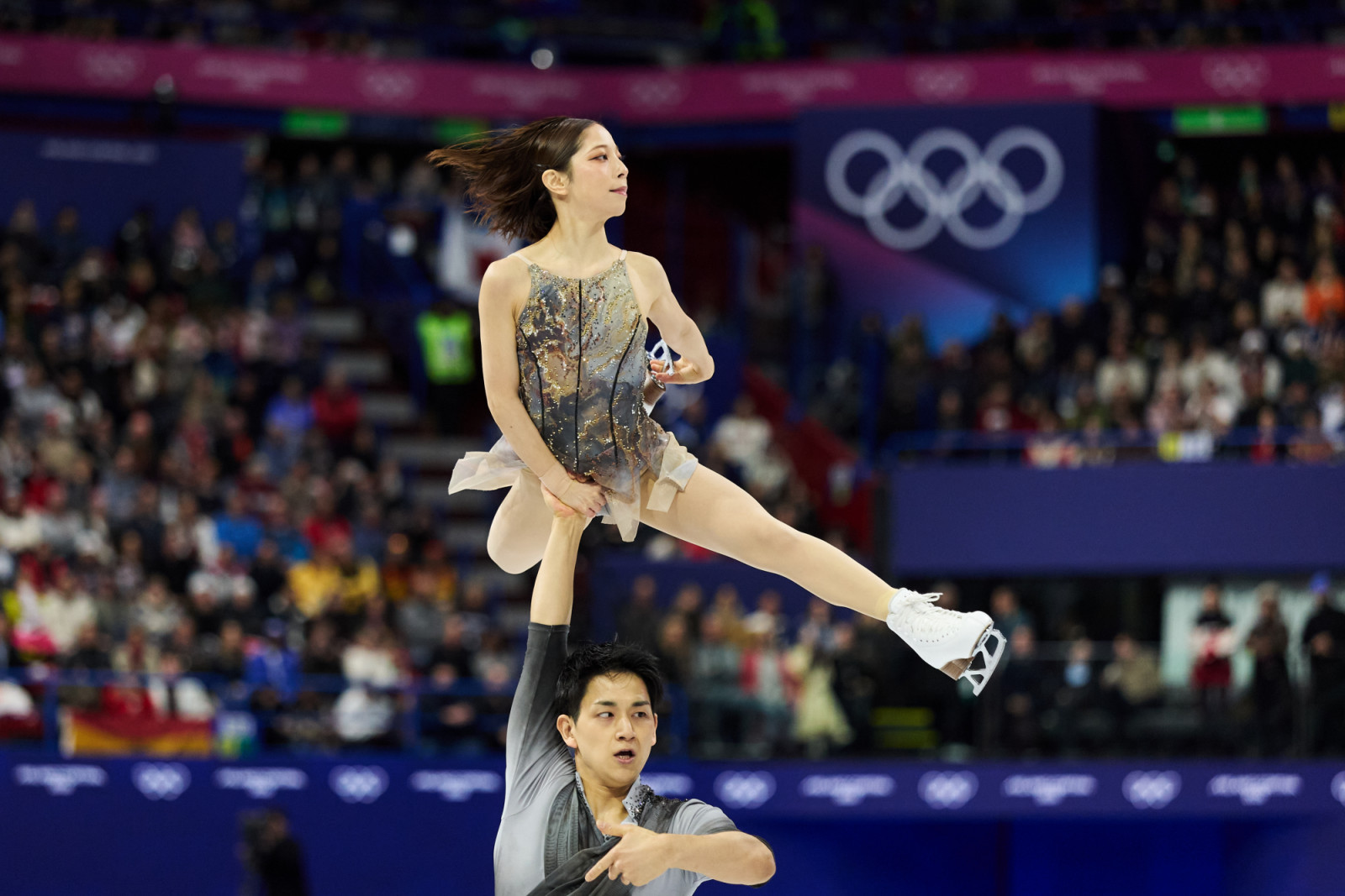MILAN, ITALY - FEBRUARY 16: Riku Miura and partner Ryuichi Kihara of Team Japan compete during Pair Skating - Free Skating on day ten of the Milano Cortina 2026 Winter Olympic games at Milano Ice Skating Arena on February 16, 2026 in Milan, Italy. (Photo by Joosep Martinson/Getty Images)