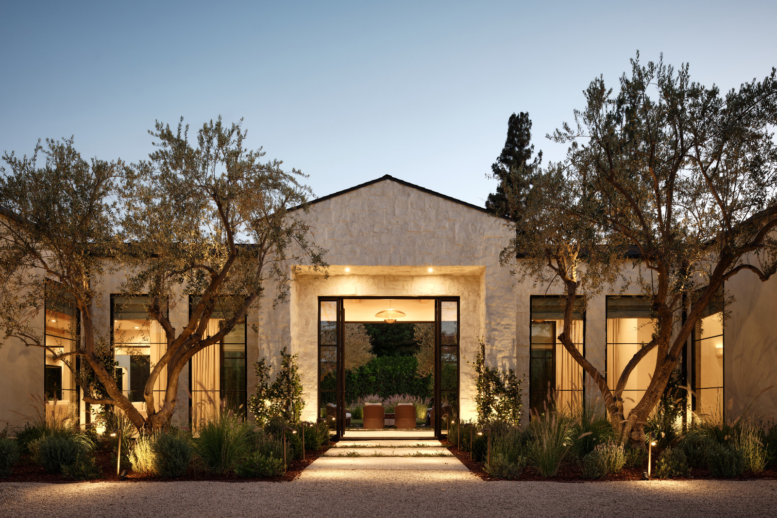 The exterior of a Tuscan-inspired Los Angeles, California home designed by Lidan Sfadia and Edward Grigoryan