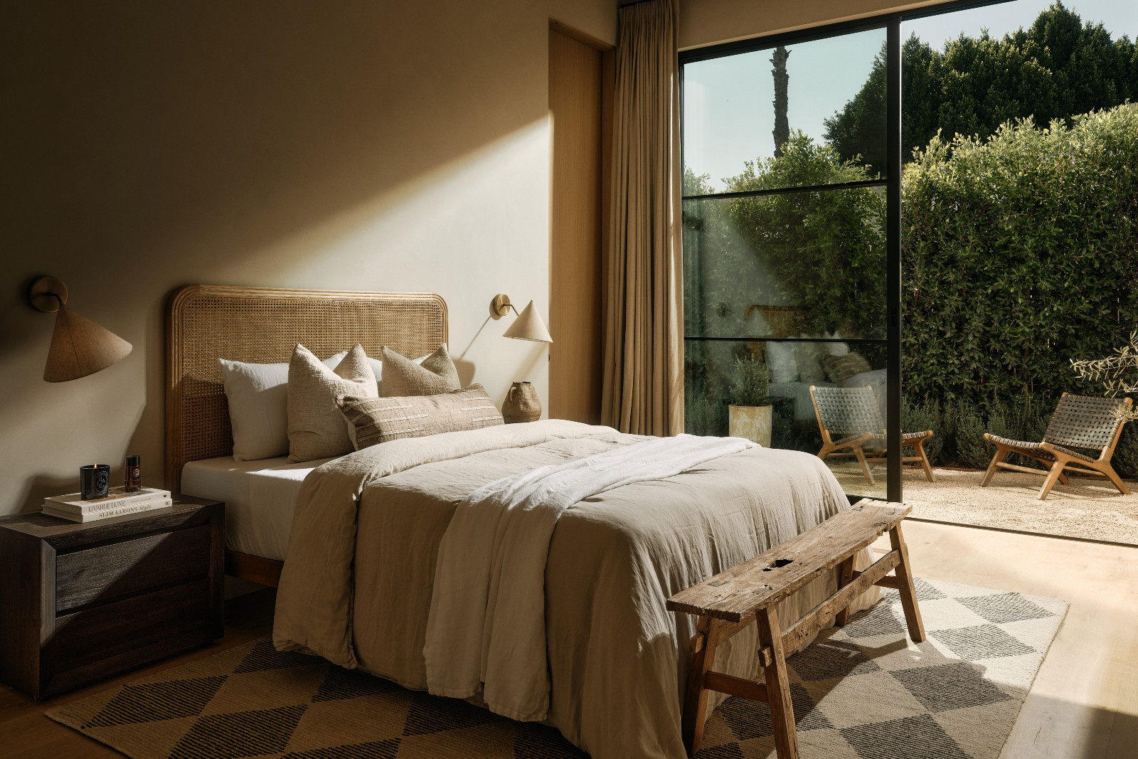 The bedroom of a Tuscan-inspired Los Angeles, California home designed by Lidan Sfadia and Edward Grigoryan