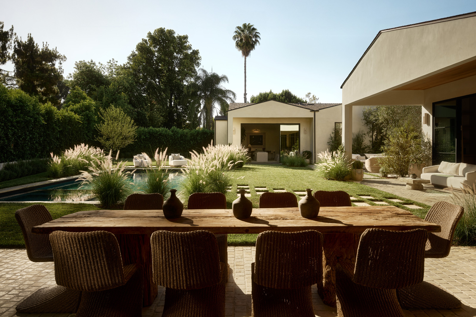 The backyard area of a Tuscan-inspired Los Angeles, California home designed by Lidan Sfadia and Edward Grigoryan