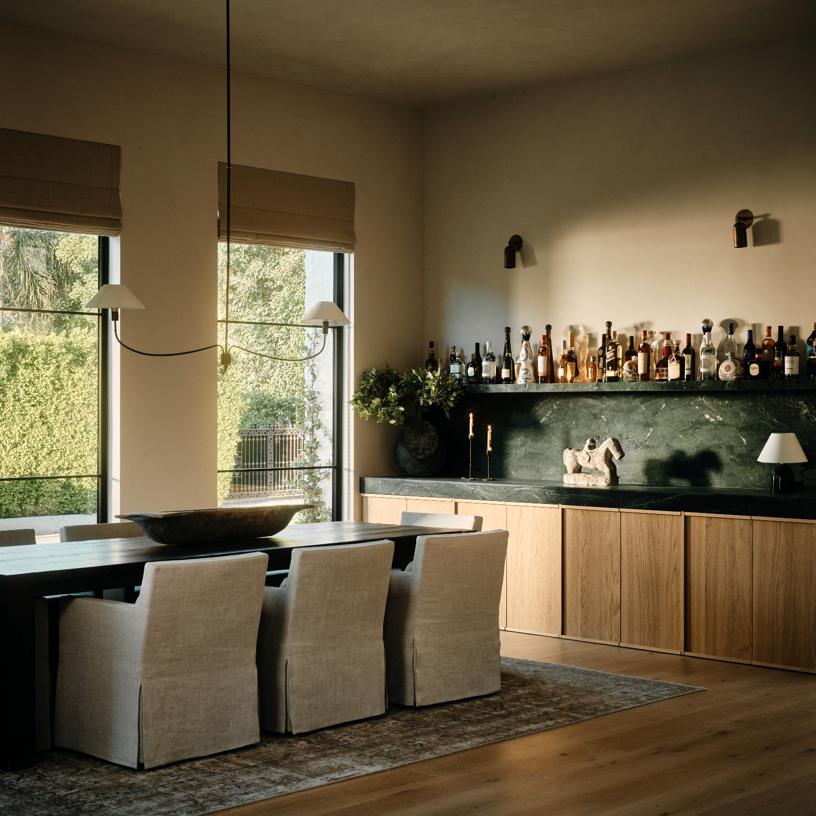 The dining room of a Tuscan-inspired Los Angeles, California home designed by Lidan Sfadia and Edward Grigoryan