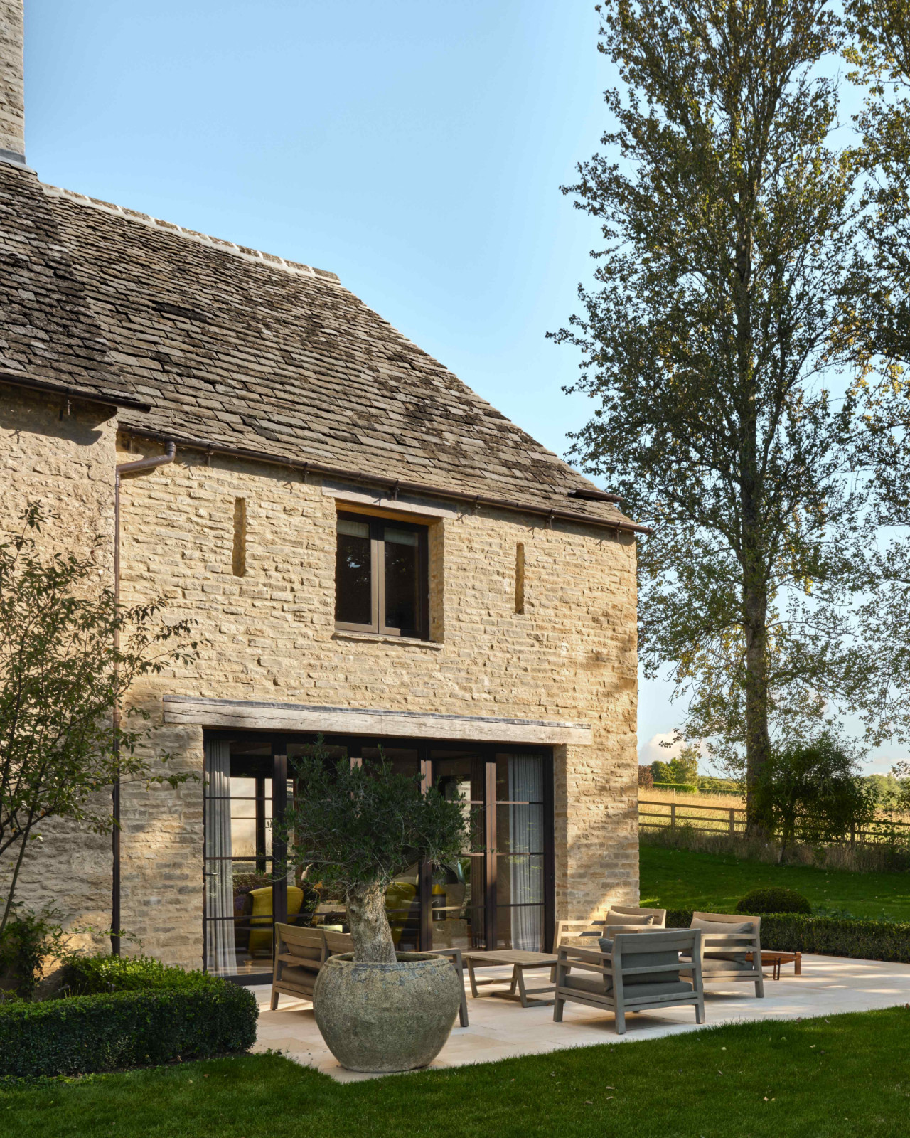 The original stone house accommodates four bedrooms, a playroom, boot room, laundry, pantry and scullery