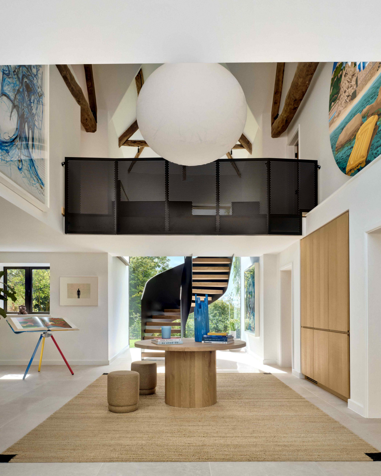 Soft, neutral tones punctuated by subtle accents of green and deep inky blue