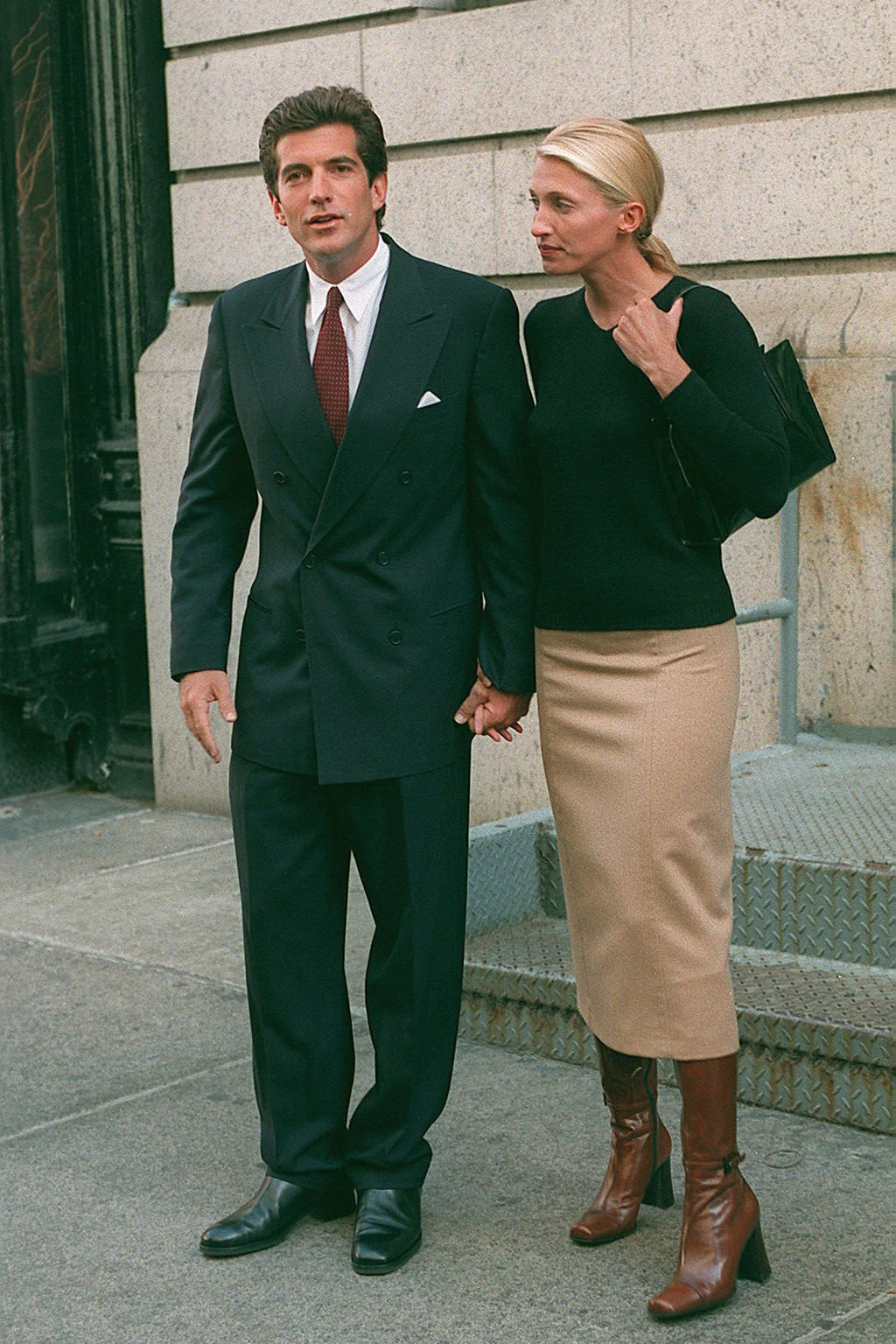 (Original Caption) John-John and Carolyn Kennedy leaving their New York apartment in Tribeka district. (Photo by Lawrence Schwartzwald/Sygma via Getty Images)