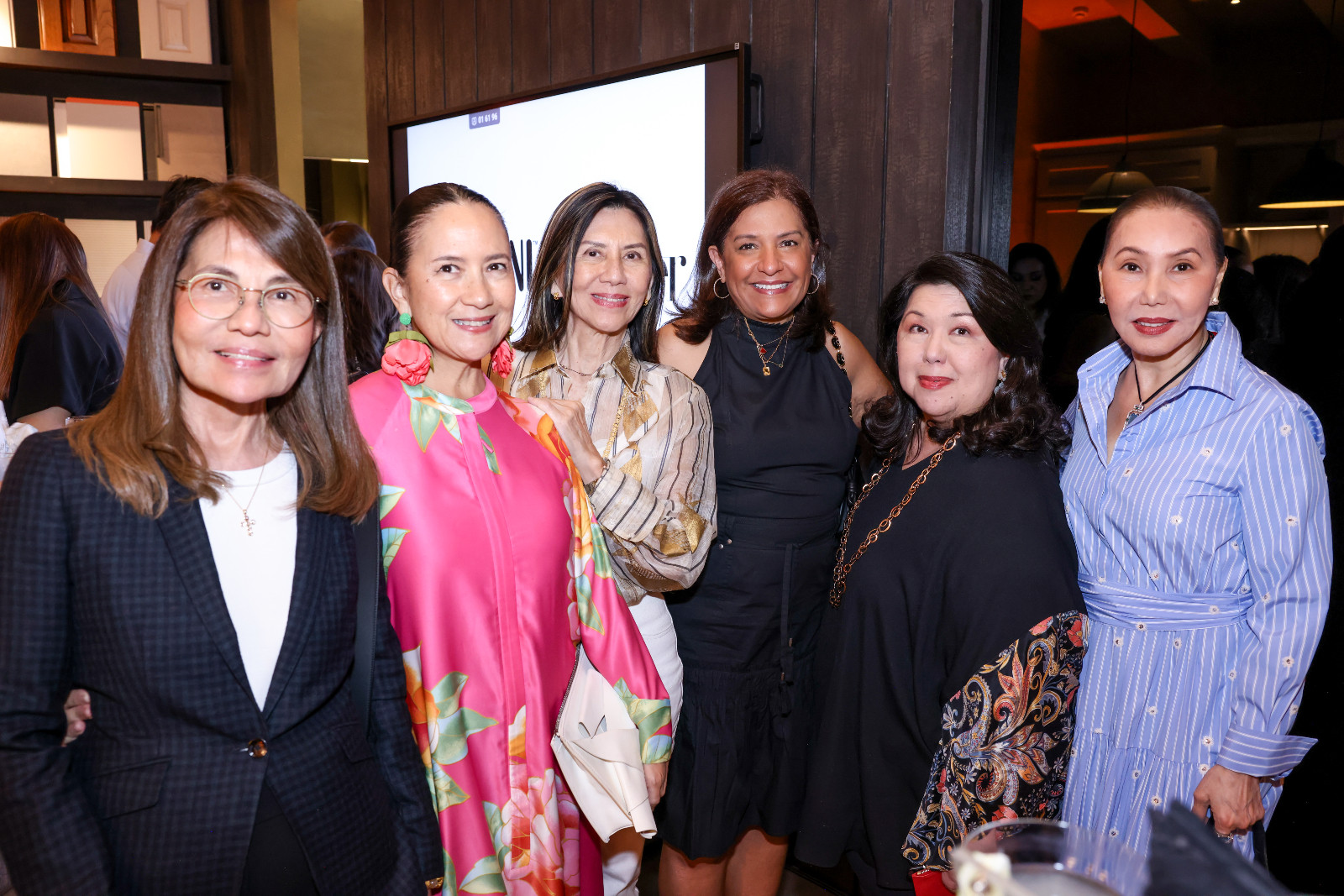 X, Mia Borromeo, X, X, Irene Martel Francisco, and X at the launch of Scavolini's new showroom at the Proscenium at Rockwell