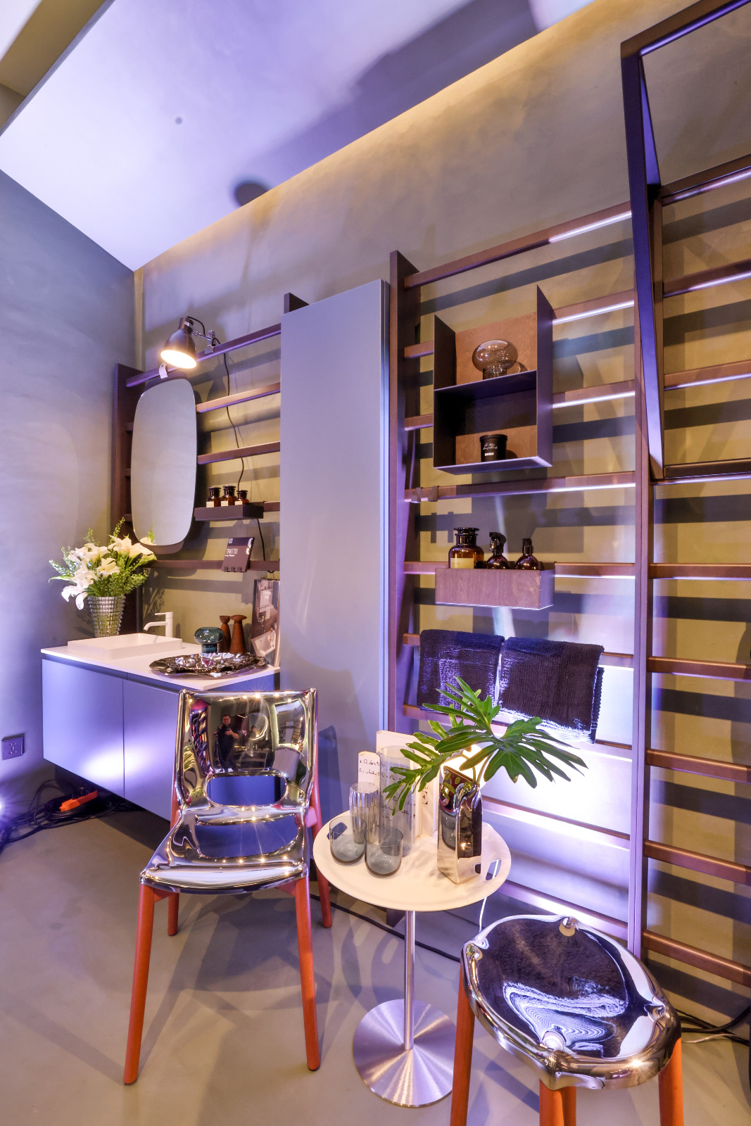 Interior designer Iris Ocampo staged the bathroom and home gym vignette for Scavolini's new showroom at the Proscenium at Rockwell
