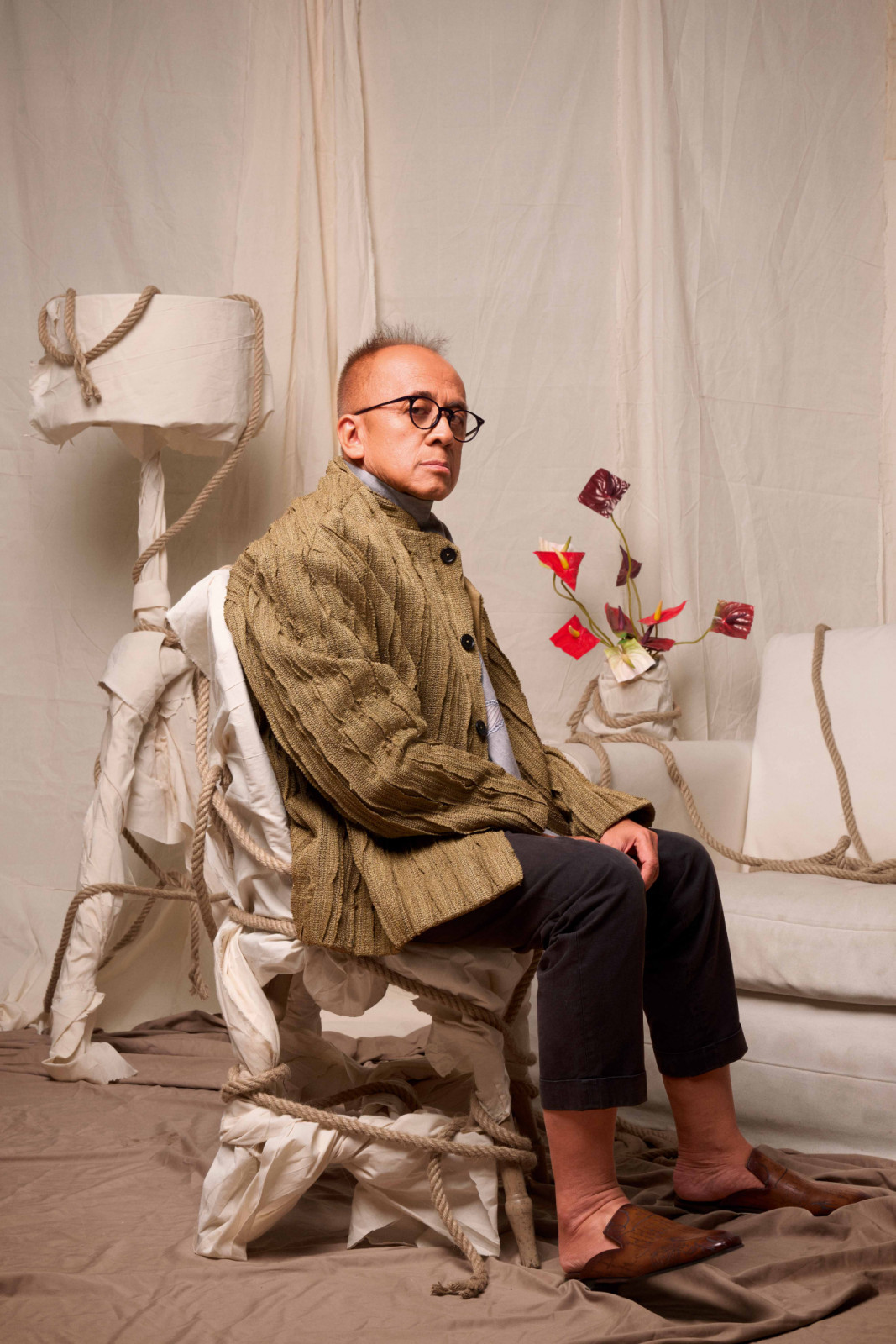 Indonesian architect Andra Matin, photographed here in a Sapto Djojokartiko top and jacket. (Portrait by Glenn Prasetya)