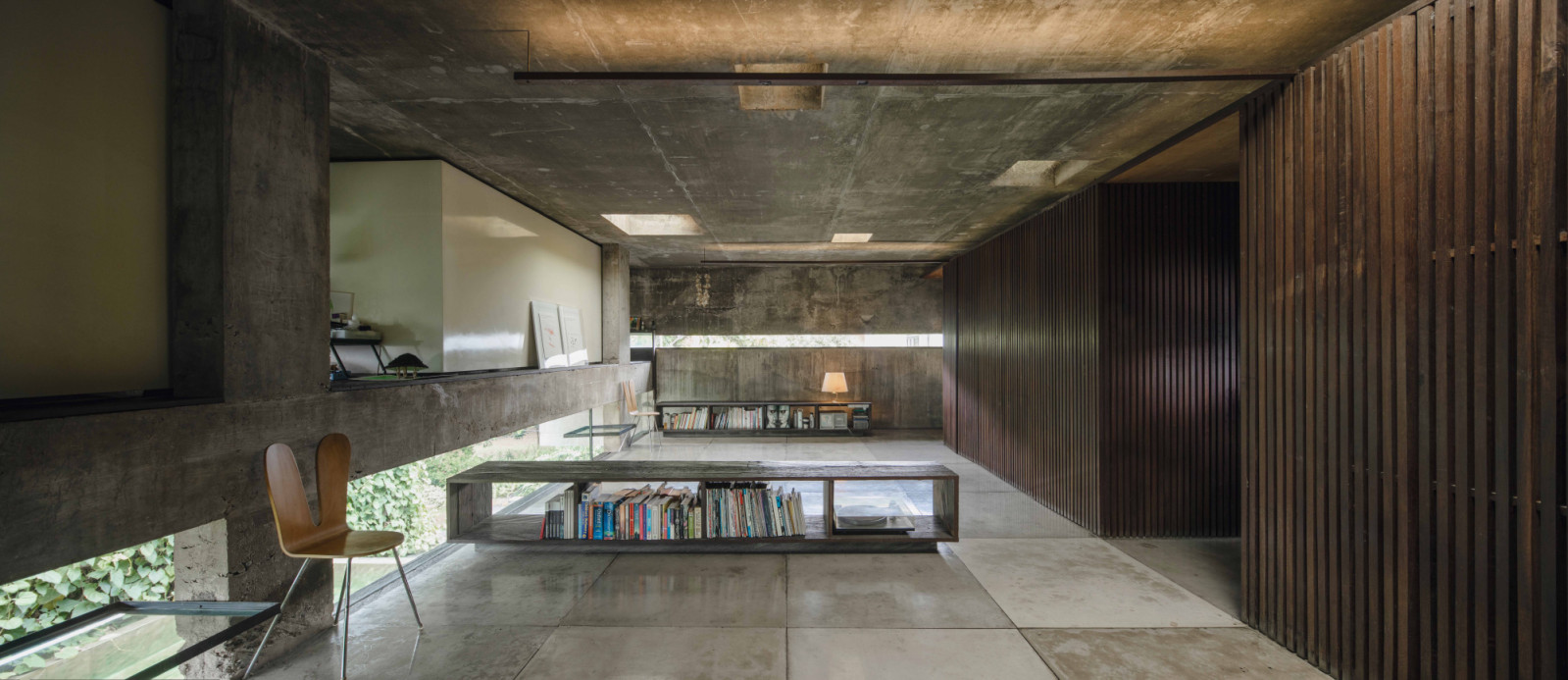 The shared children’s bedroom at AM House, Andra’s own residence, featuring cocooning, elevated sleeping boxes inspired by Japanese capsule hotels. (Photo by Davy Linggar)