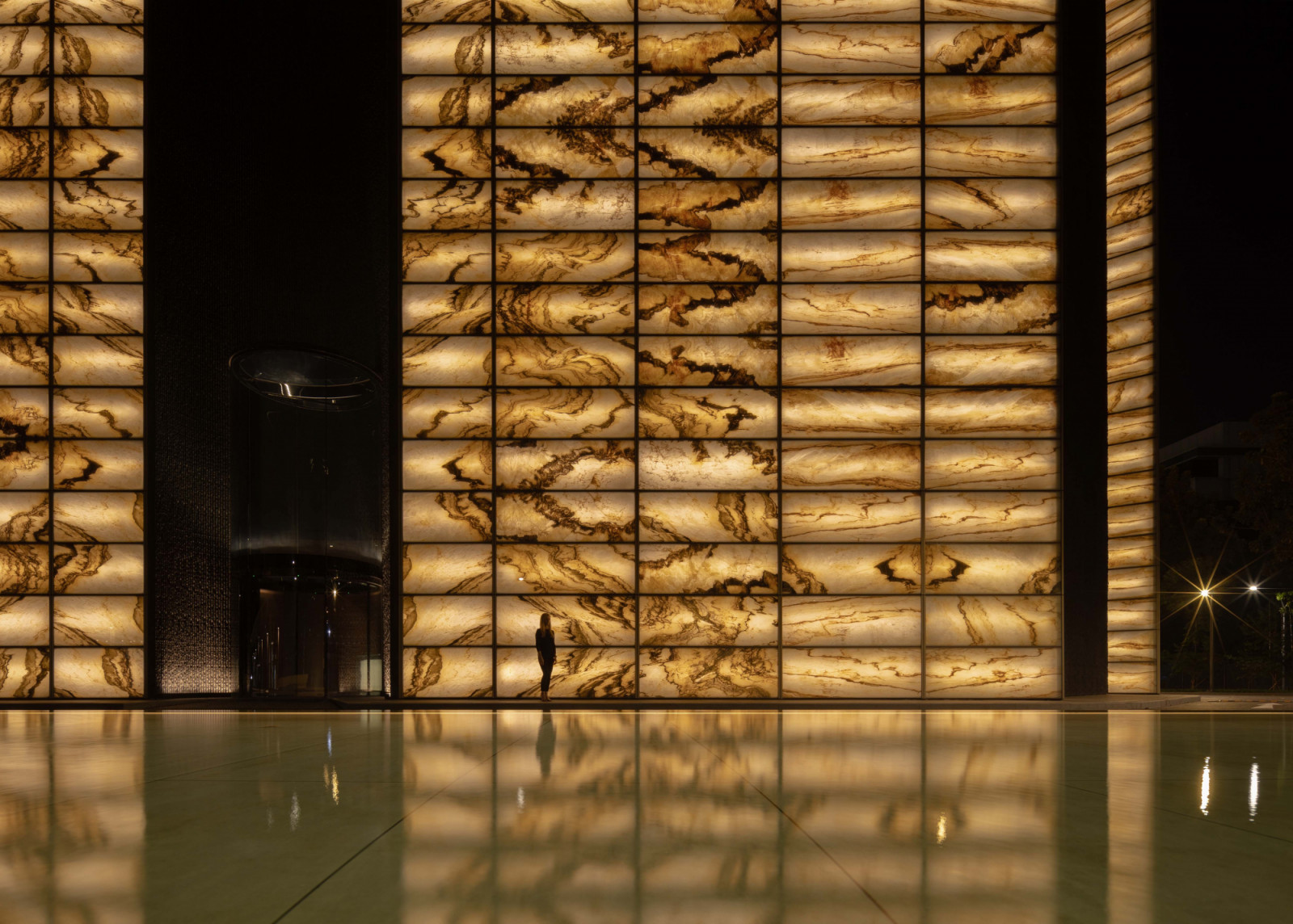 Close-up of the The Reserve’s carefully lit onyx panels that express the preciousness of the assets stored within. (Photo: Finbarr Fallon)