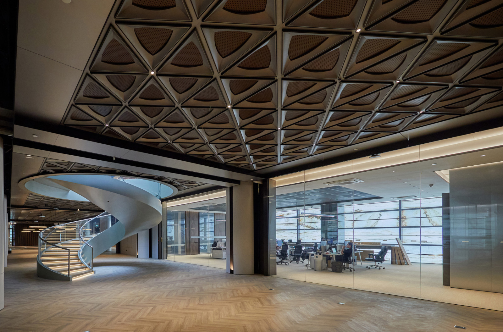 The lower level of The Reserve is lit to showcase its many offices and retail units. (Photo: Finbarr Fallon)