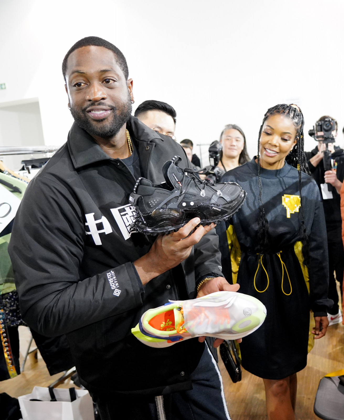 Dwyane Wade and Gabrielle Union attend the Li-Ning Menswear Fall/Winter 2020-2021 show as part of Paris Fashion Week on January 18, 2020 in Paris, France. (Photo by Francois Durand/Getty Images)