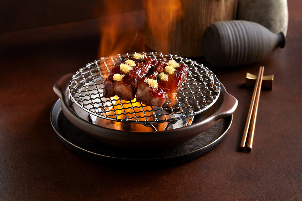 Barbecued Spanish honey-glazed Ibérico pork with finger lime